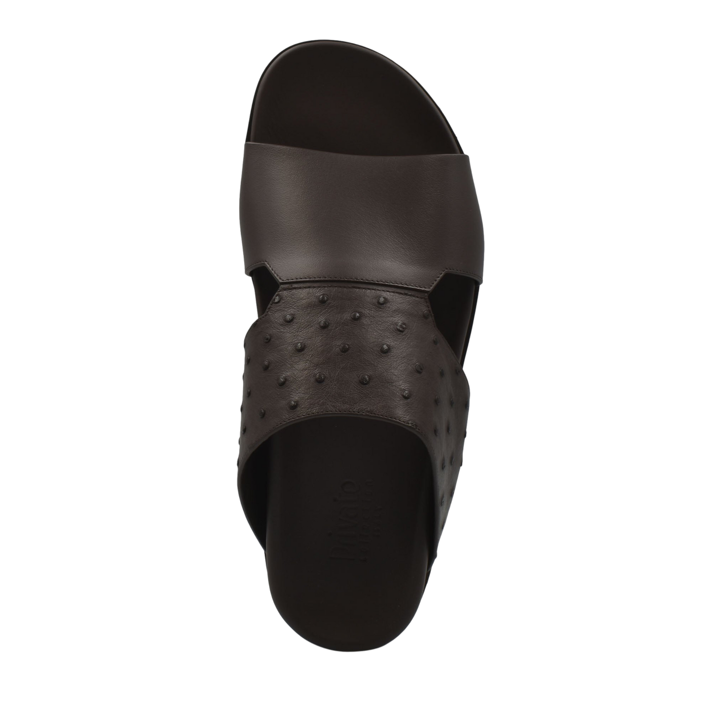 Black slide sandal with smooth and textured design made from ostrich leather footwear