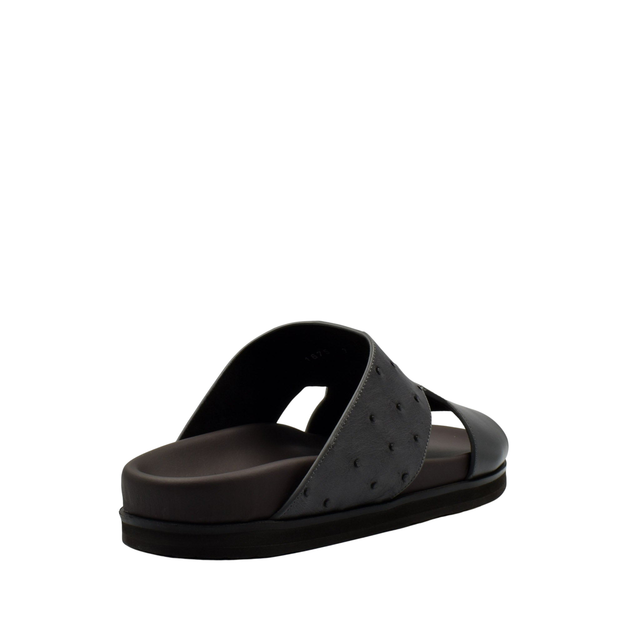 Black slide sandal from private collection featuring ostrich leather footwear design with textured upper
