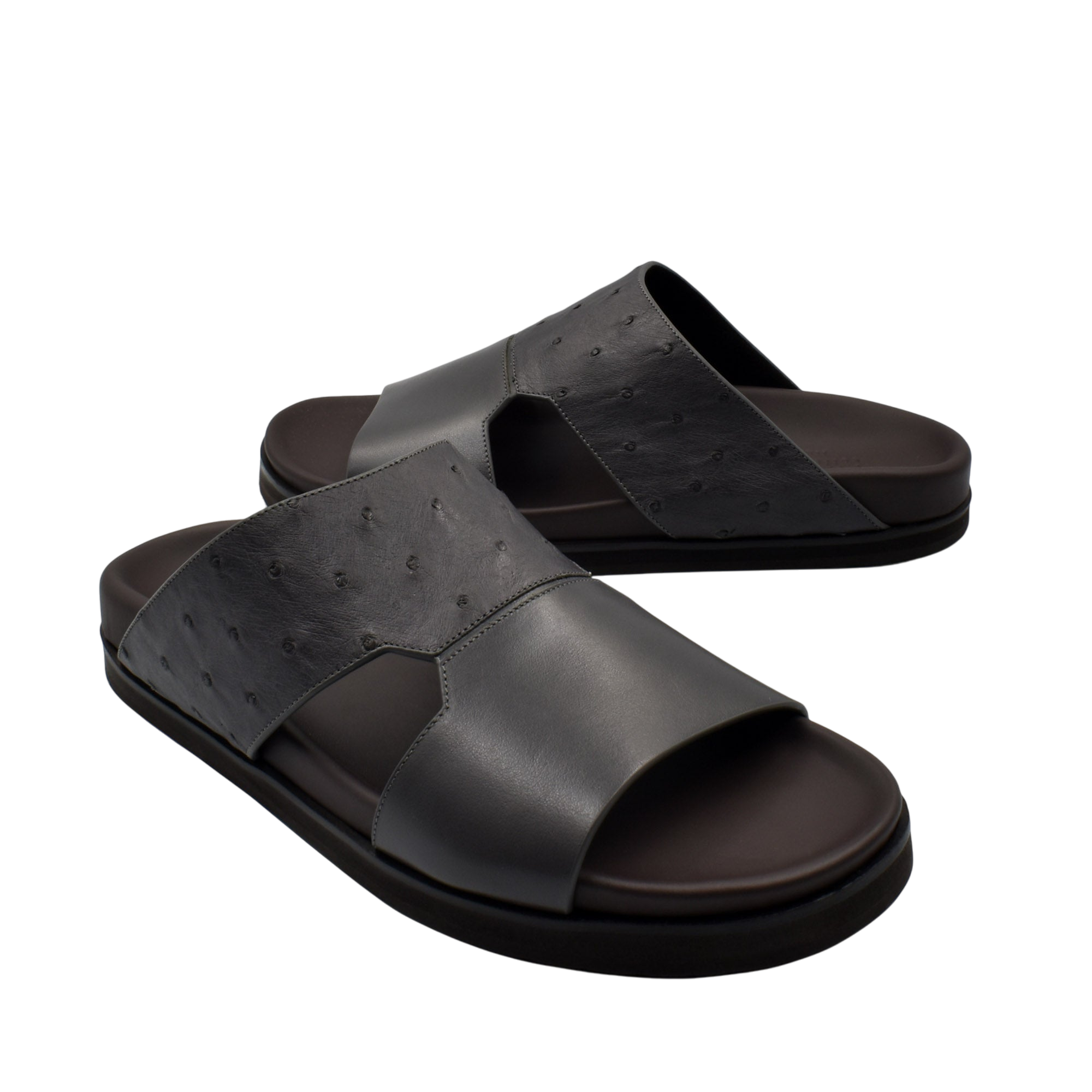 Black slide sandals made from premium ostrich leather footwear with cushioned sole for comfort