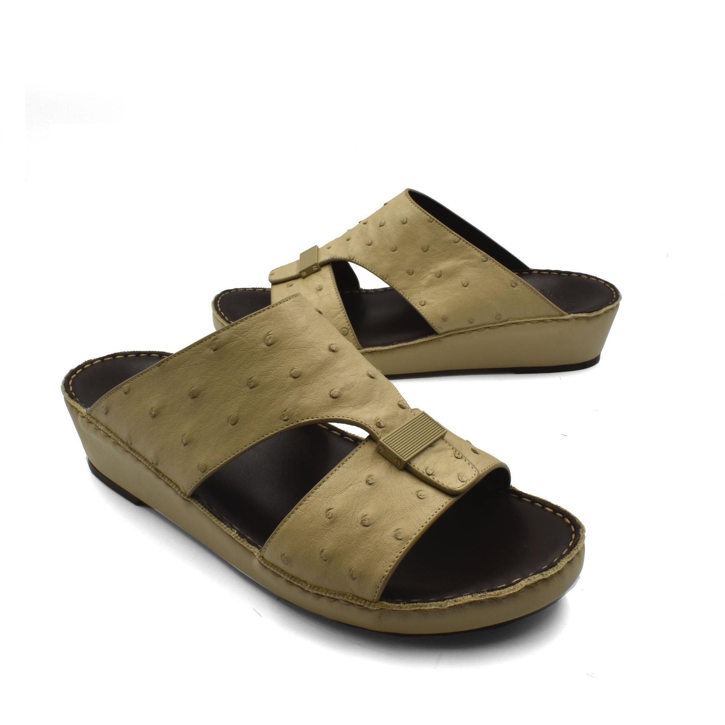 Tan ostrich leather sandals with open toe and wedge sole for comfortable casual wear