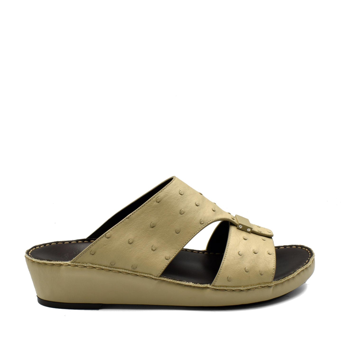 Beige ostrich leather sandals with a slip-on wedge design and textured leather upper