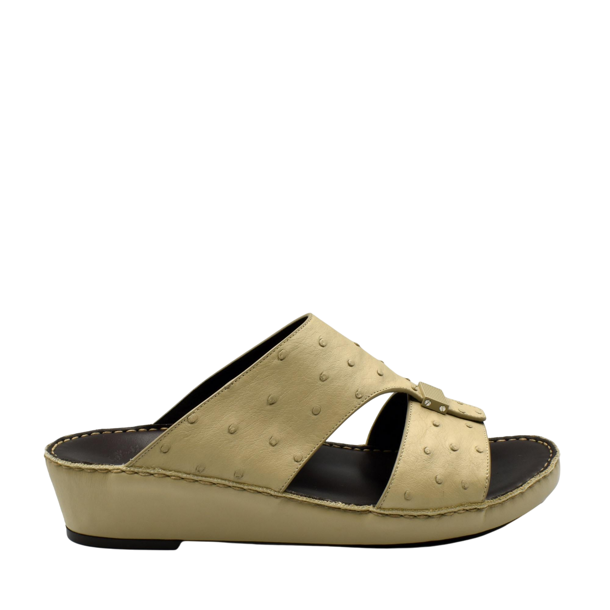 Beige ostrich leather sandals with a slip-on wedge design and textured leather upper