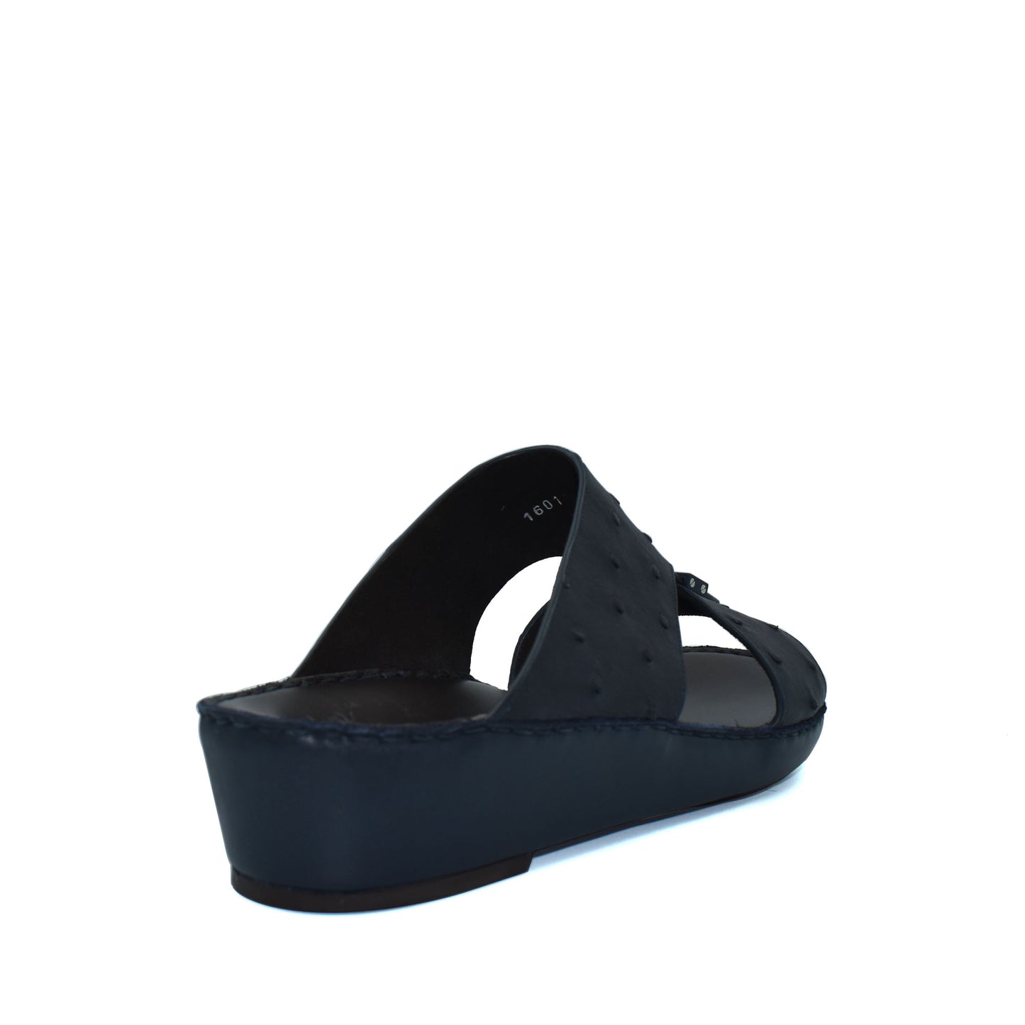Black ostrich leather sandals with cushioned wedge sole and open toe design from Private collection