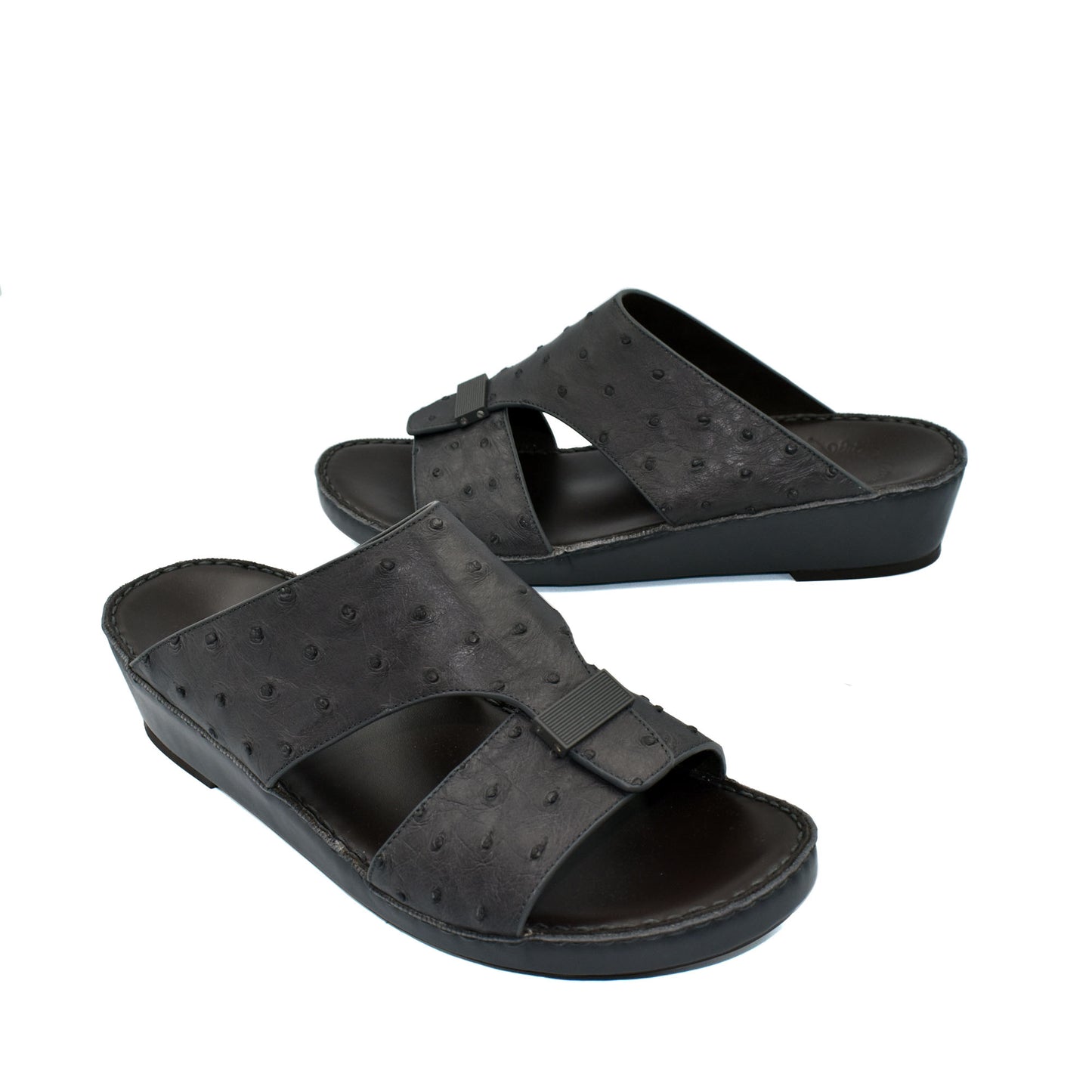 Black ostrich leather sandals with open toe and adjustable strap from Private Collection