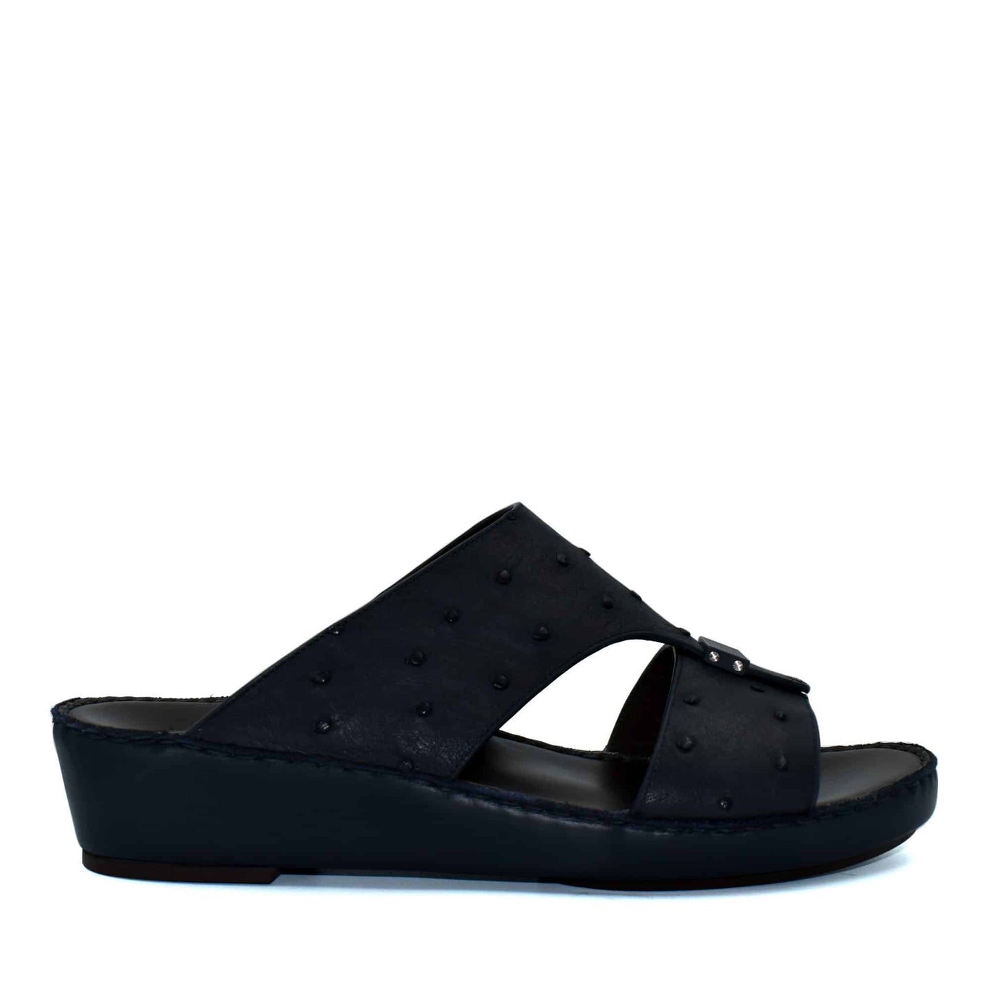 Black ostrich leather sandals with a wedge sole and textured upper from Private Collection