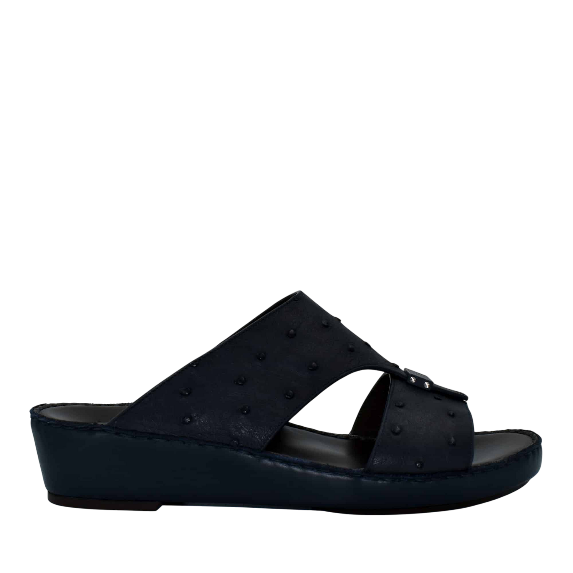 Black ostrich leather sandals with a wedge sole and textured upper from Private Collection