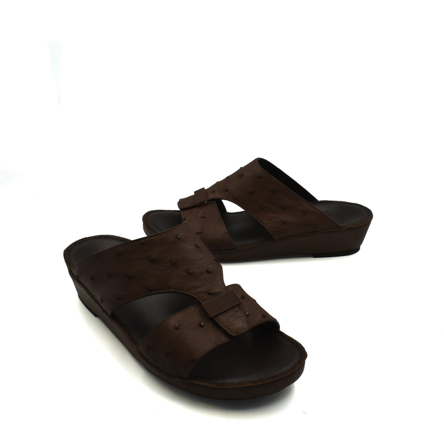 Brown ostrich leather sandals with adjustable straps and comfortable footbed from Private Collection
