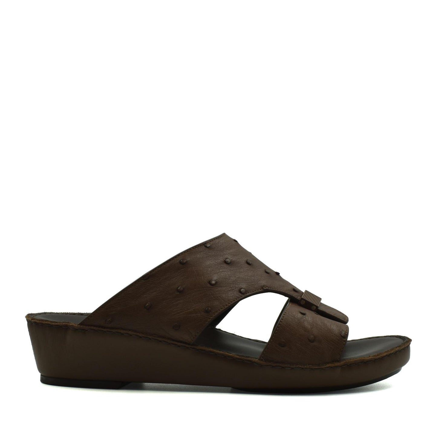 Brown ostrich leather sandals with wedge sole and open toe design from Private Collection
