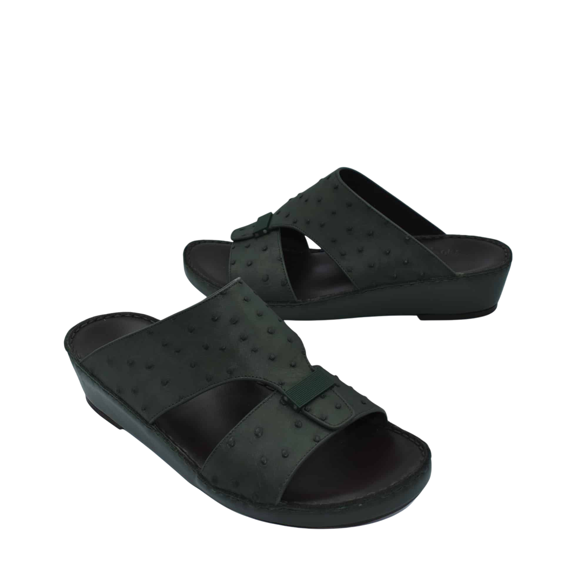 Black ostrich leather sandals with adjustable buckle straps and comfortable wedge sole