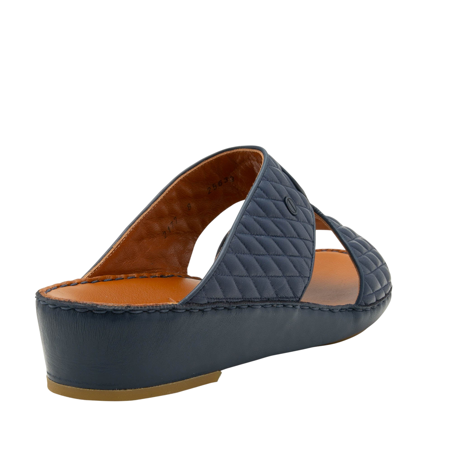 Navy Peninsula Lamb Matelasse sandals with quilted straps and cushioned brown footbed