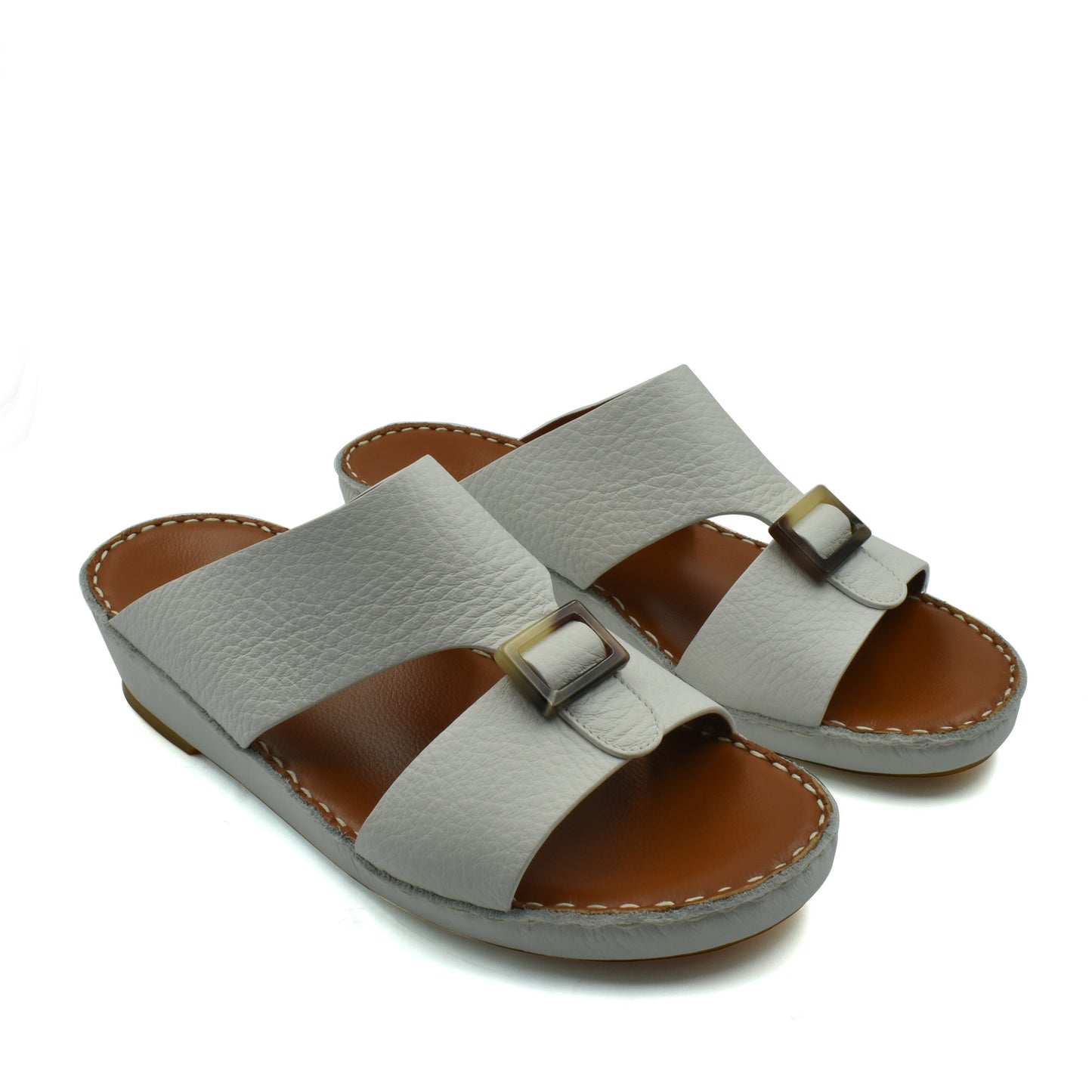 White premium Deercalf footwear slide sandals with adjustable buckle straps and cushioned brown footbed