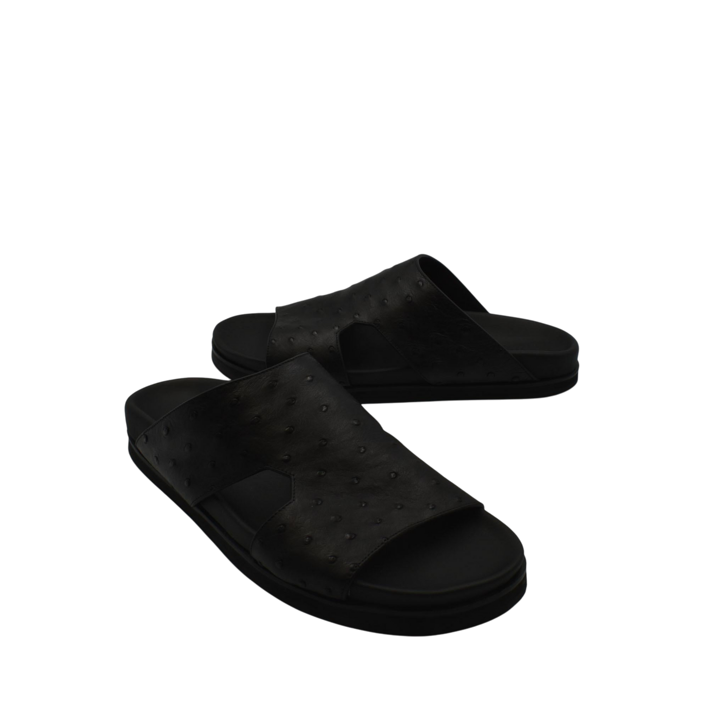 Black premium ostrich leather footwear slide sandals with textured upper and cushioned sole