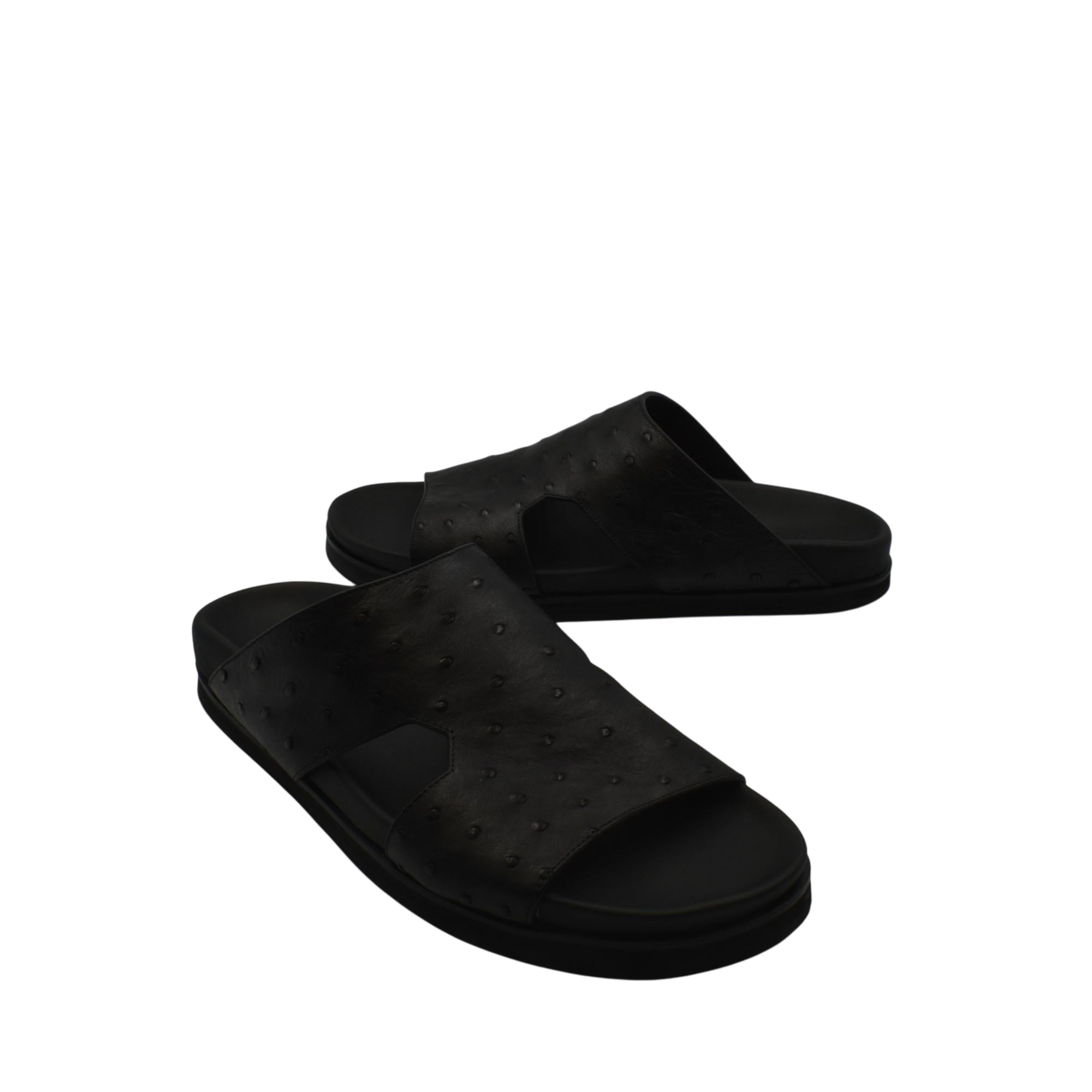 Black premium ostrich leather footwear slide sandals with textured upper and cushioned sole