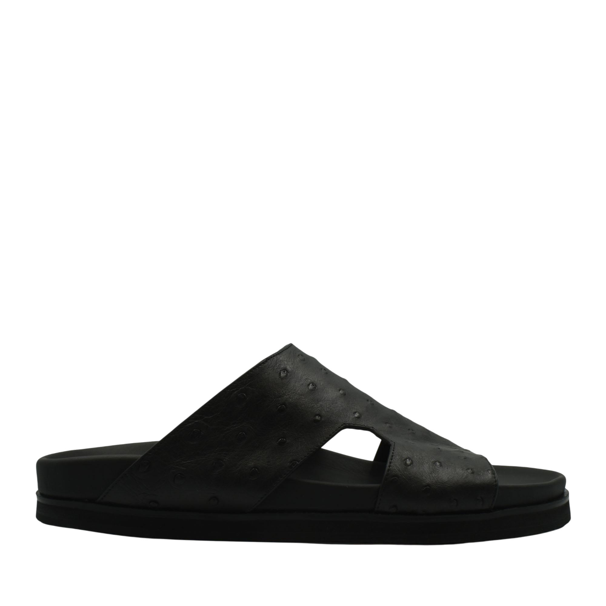 Black slide sandal made from premium ostrich leather footwear with textured upper and flat sole