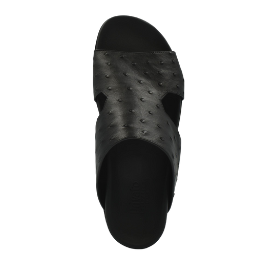 Black slide sandal made of premium ostrich leather footwear with textured pattern from private collection