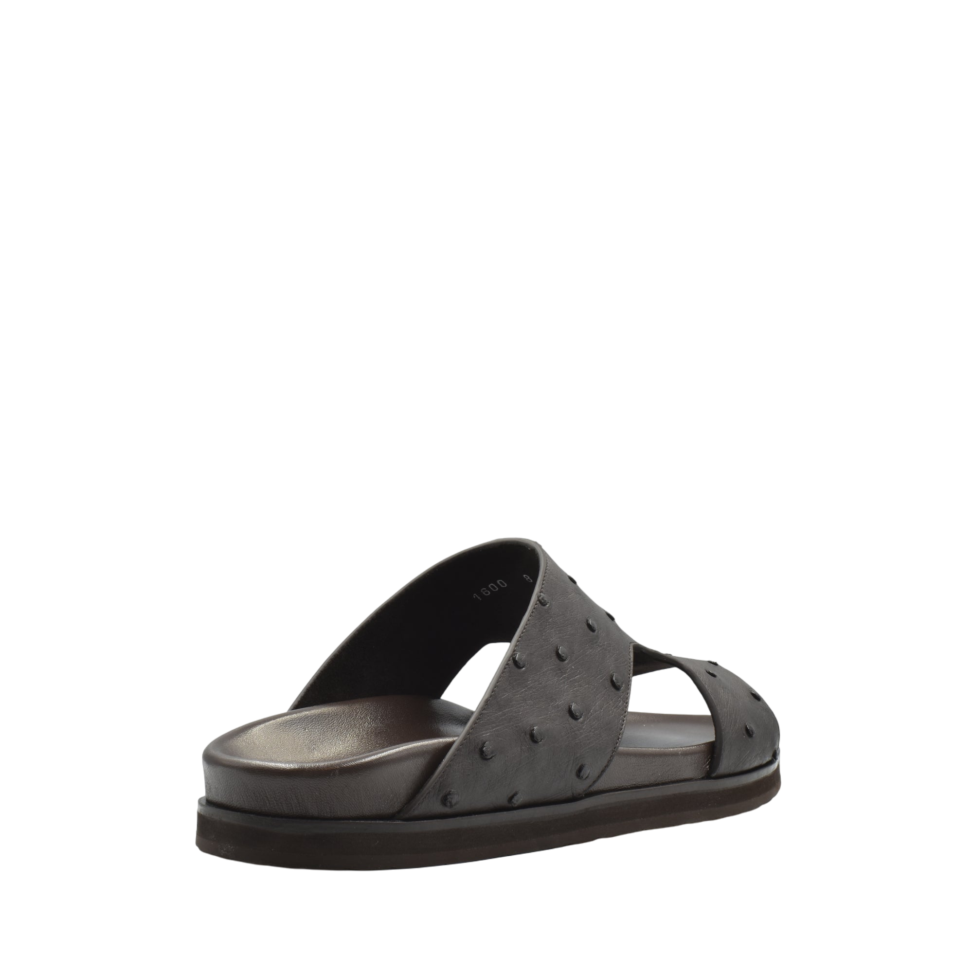 Black slip-on sandal made from premium ostrich leather footwear with textured design