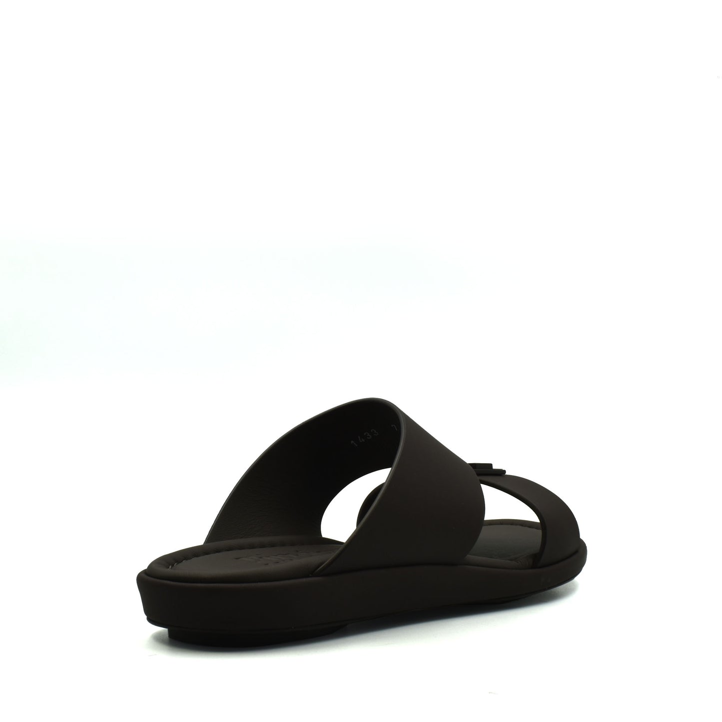 Black slide sandal from Private Collection representing prestige casual footwear with a sleek modern design