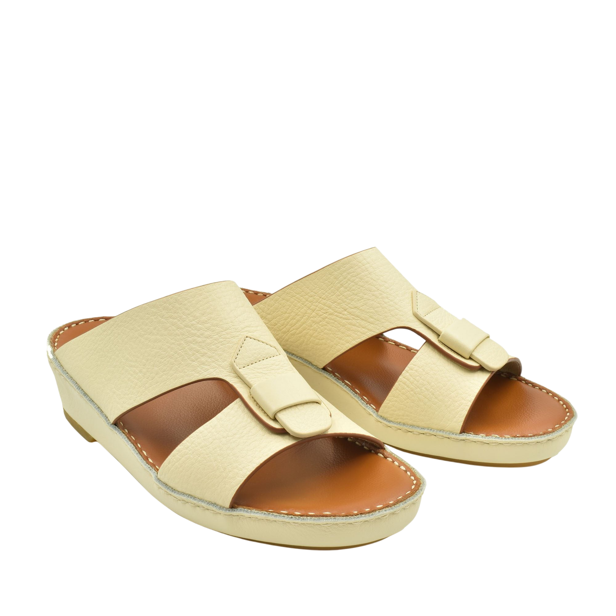 Cream color granulato leather footwear slides with adjustable strap and cushioned sole