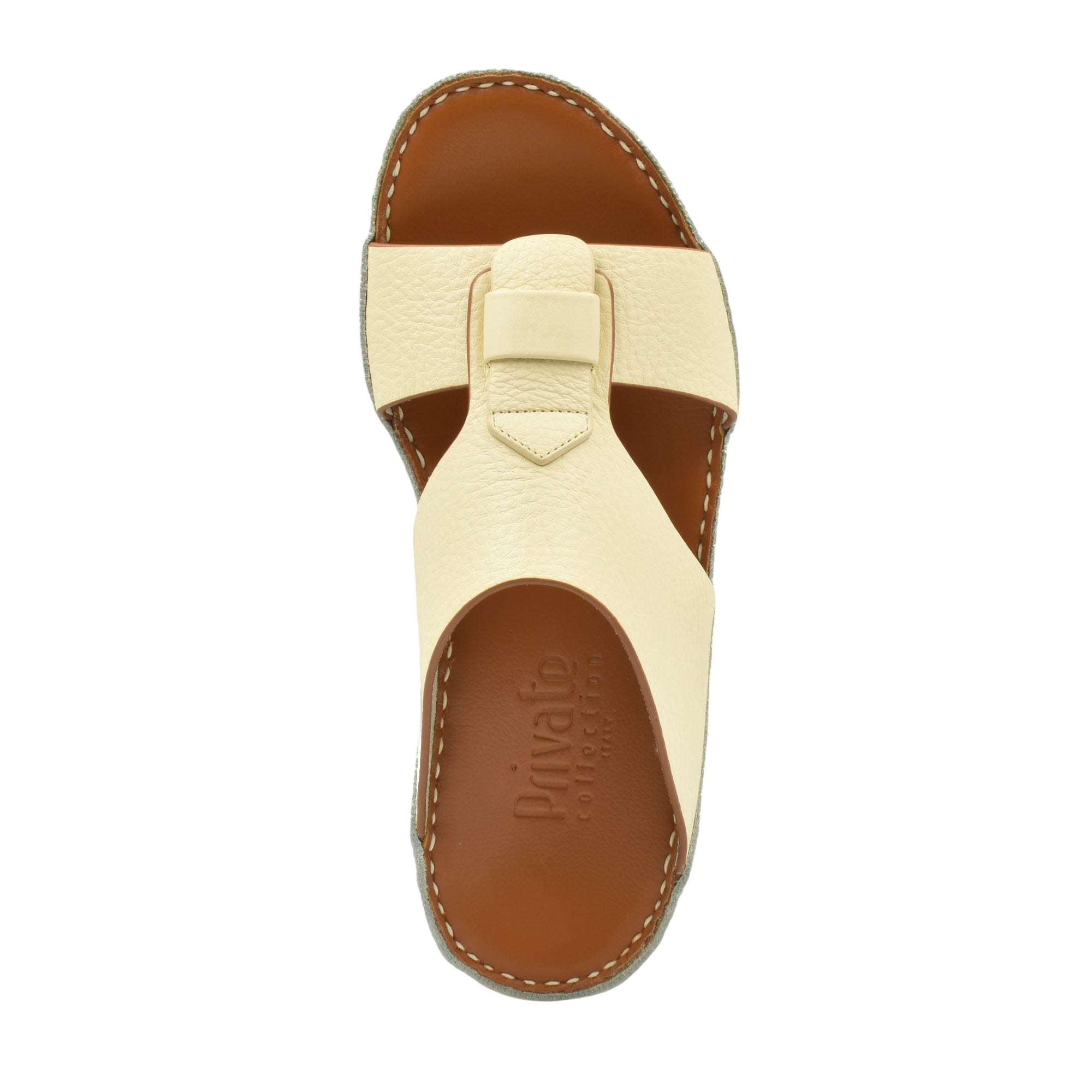 Top view of cream granulato leather footwear sandal with cushioned brown sole from Private collection