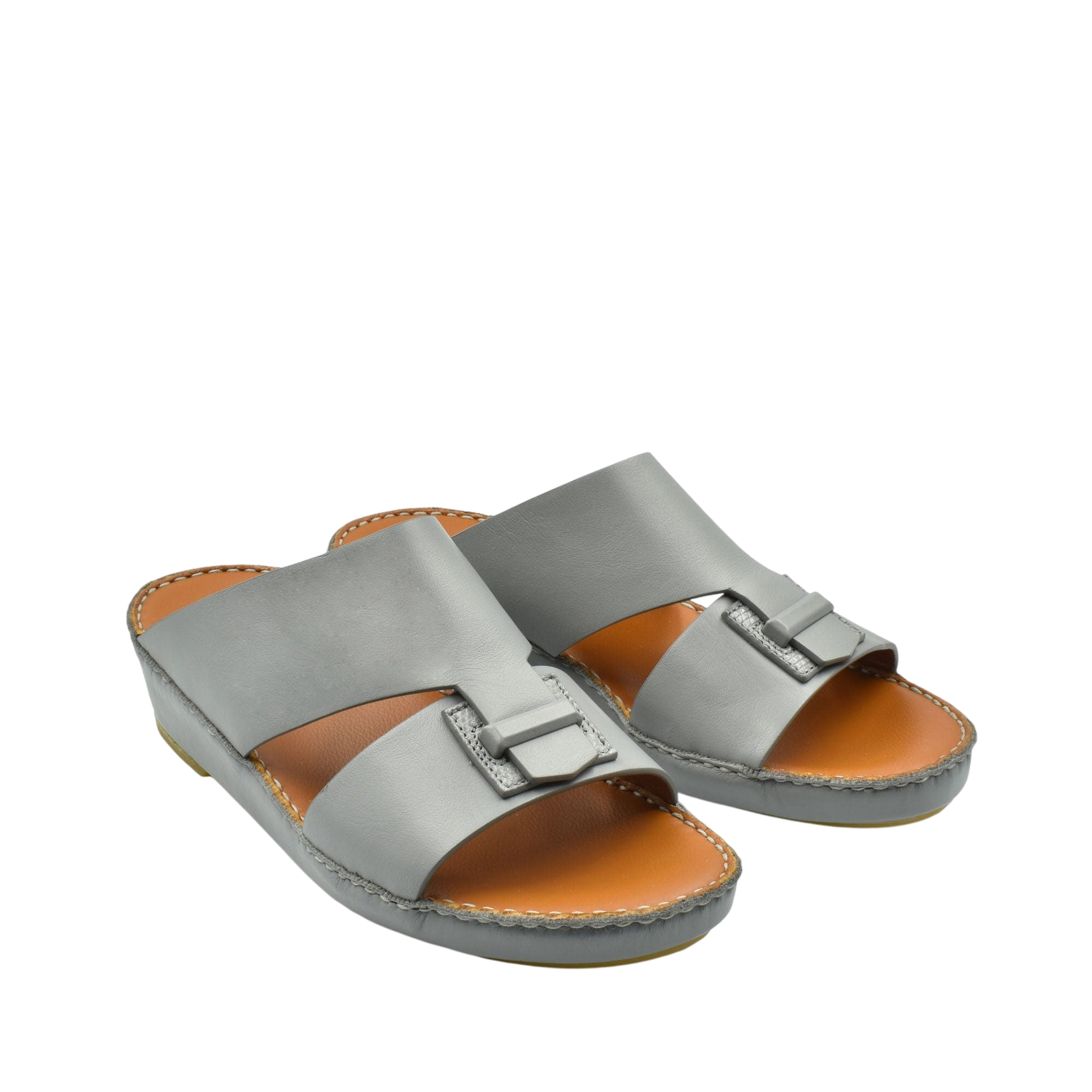 Gray luxury leather sandals with adjustable buckle straps and cushioned tan footbed for comfort