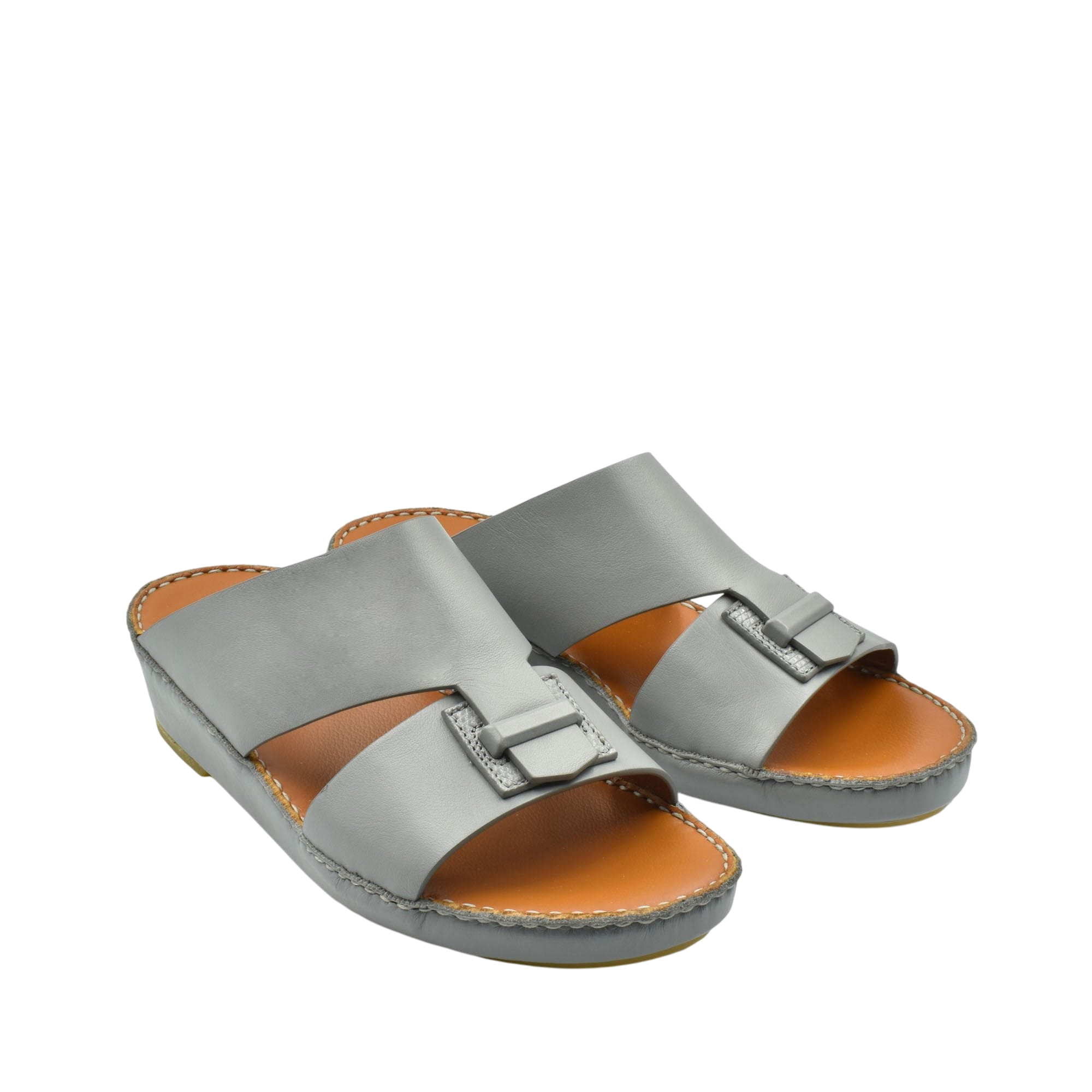 Gray luxury leather sandals with adjustable buckle straps and cushioned tan footbed for comfort