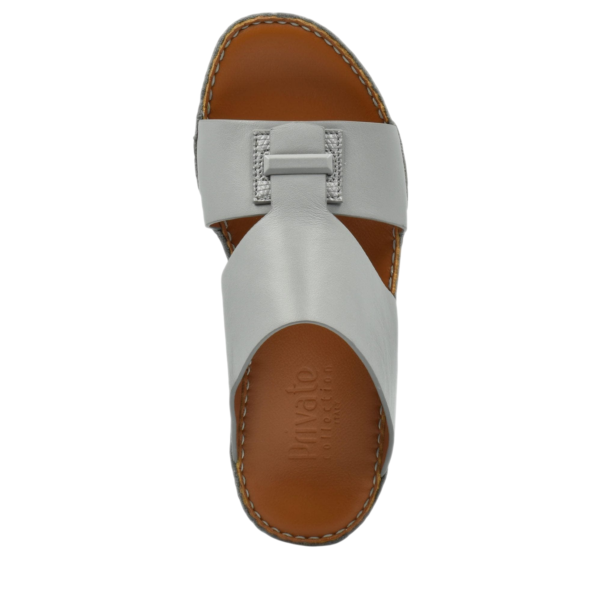 Top view of luxury leather sandals in white with brown cushioned sole by Private Collection