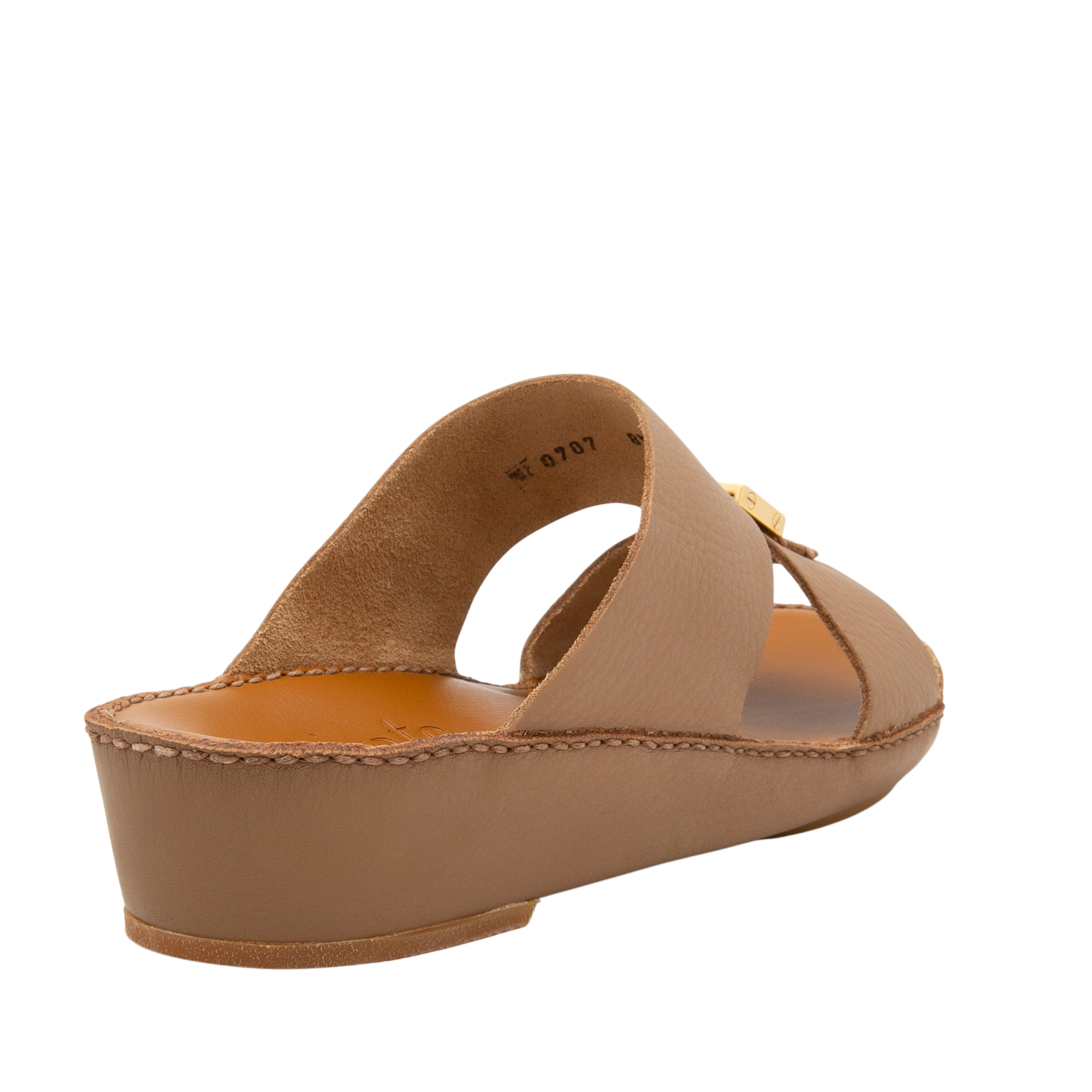 Beige metallic deercalf slides with a low wedge heel and gold buckle detail from Private Collection