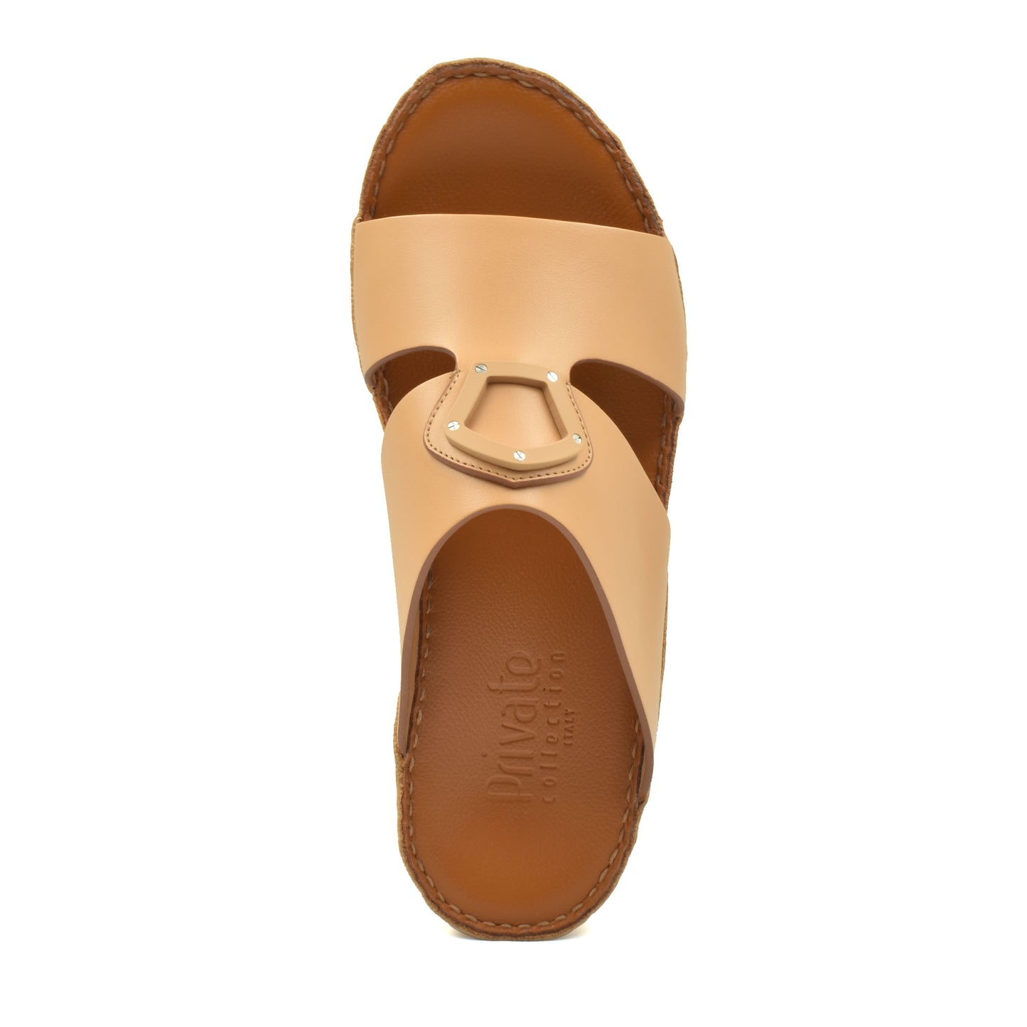 Tan natural leather slide shoes from Private Collection with decorative metal buckle detail