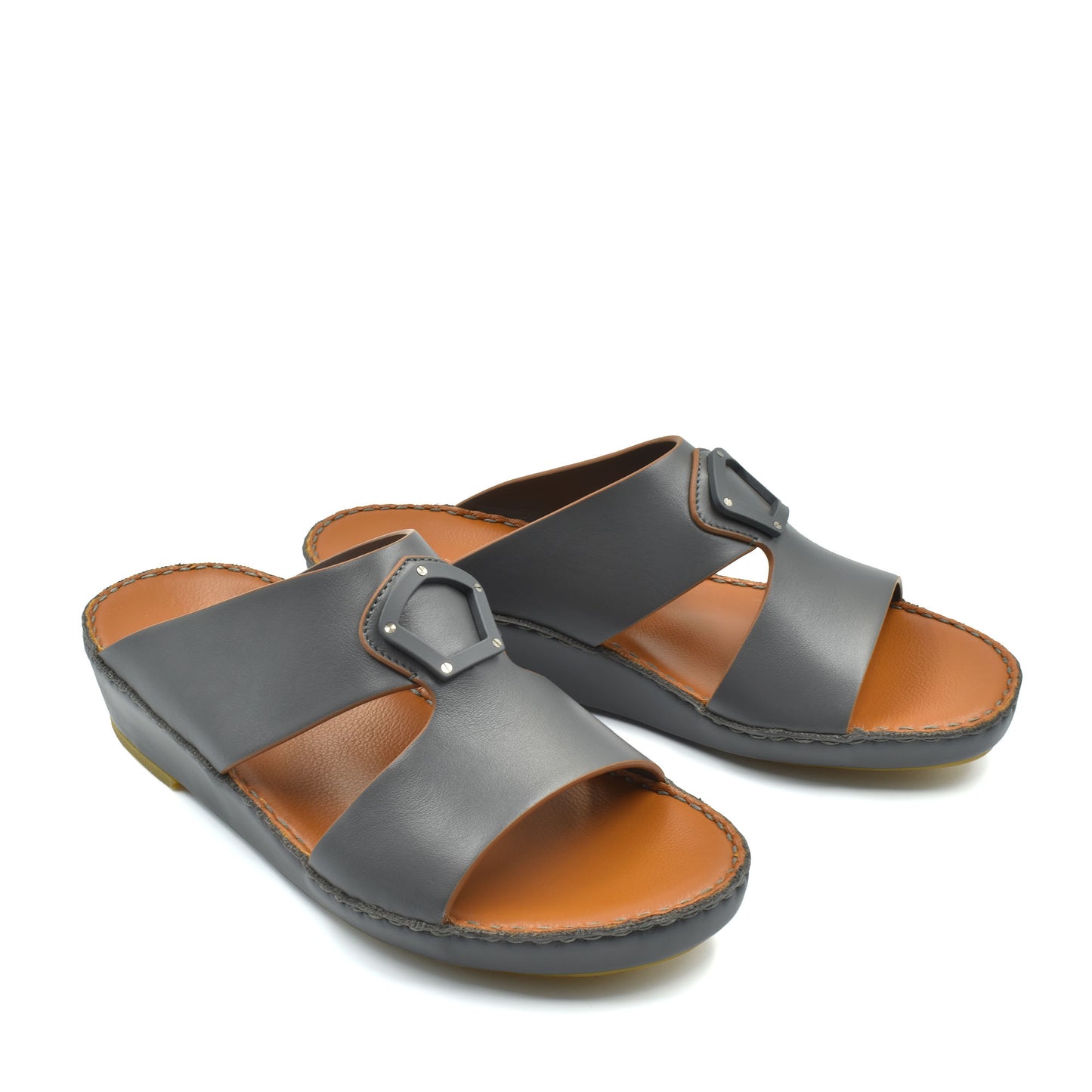 Black natural leather slide shoes with adjustable buckle straps and brown cushioned insoles