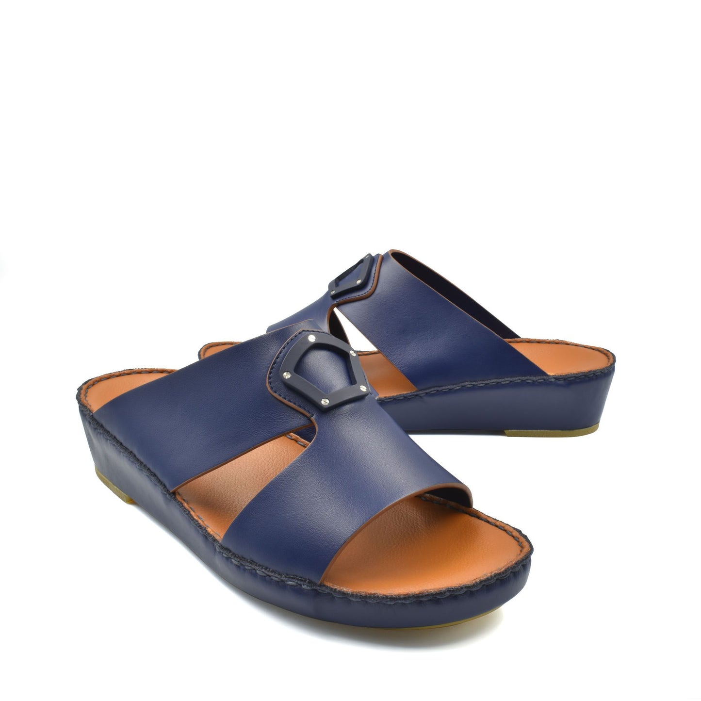Blue natural leather slide shoes with open toe and cushioned brown footbed for comfortable wear