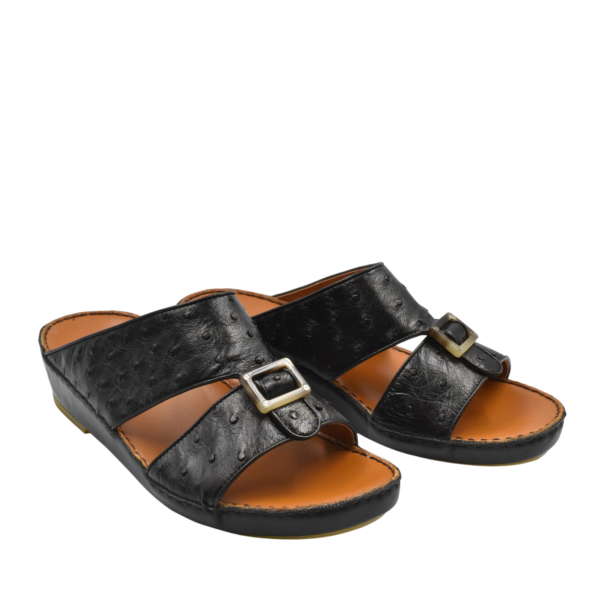 Black ostrich leather sandals with buckle detail and cushioned tan footbed