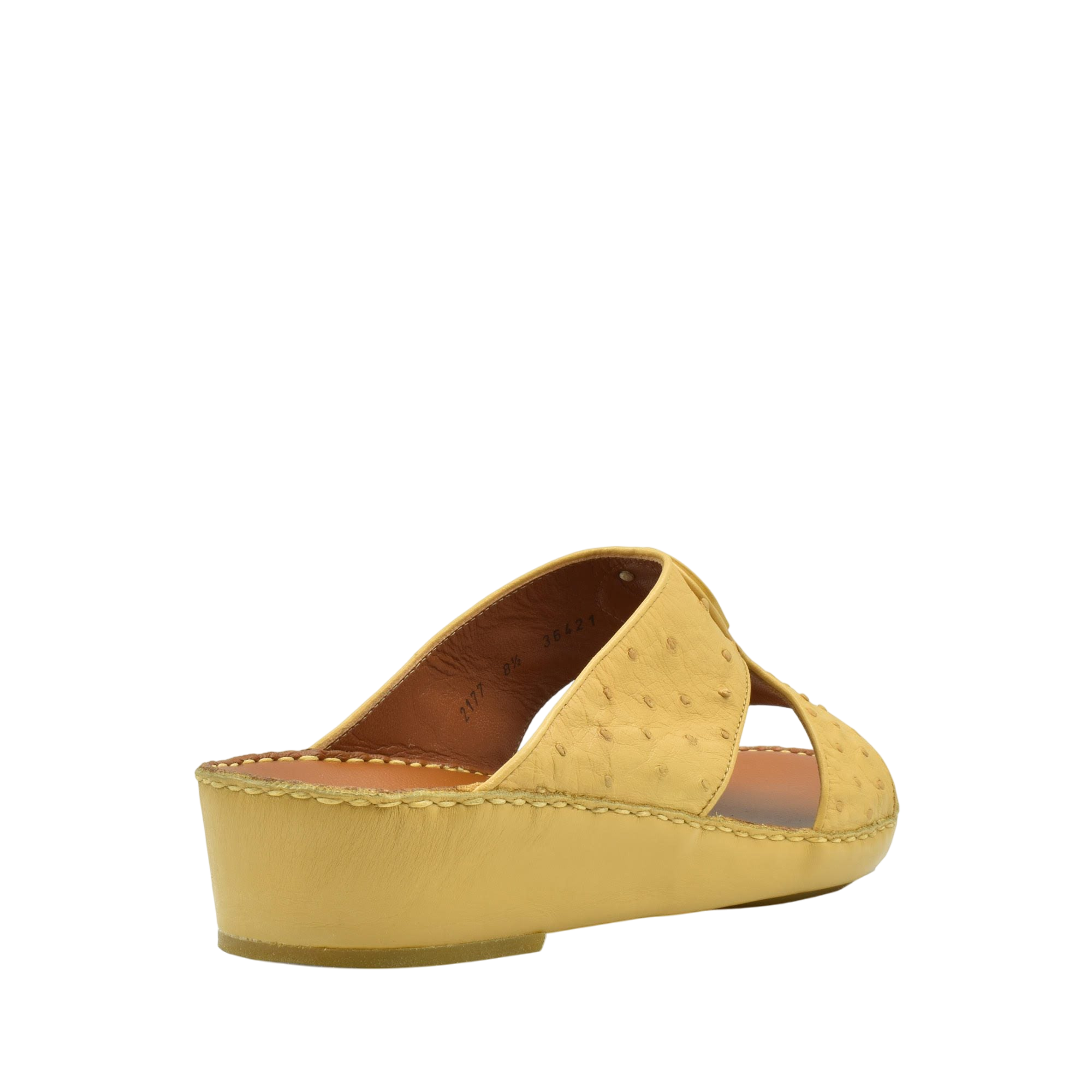 Yellow ostrich leather sandals with wedge heel and open toe design from Private collection
