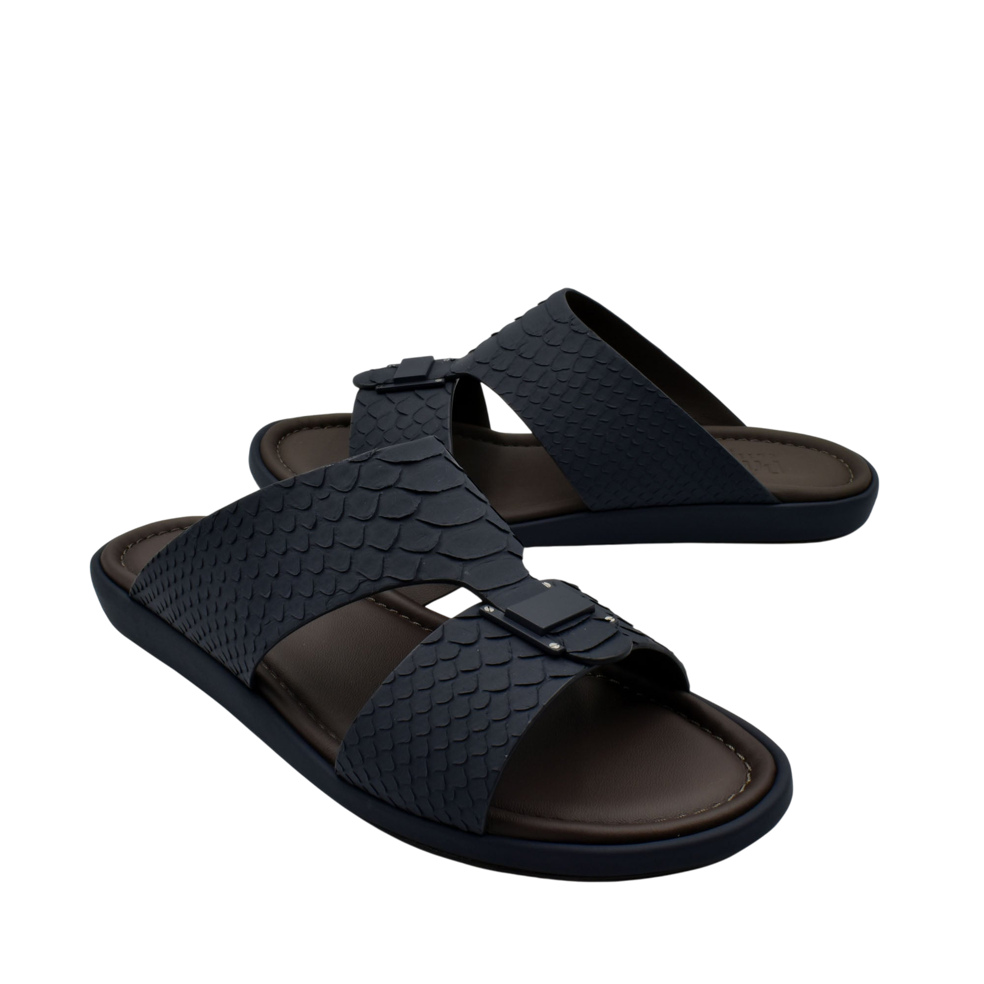 Black python skin footwear slides with textured straps and adjustable buckles for comfortable wear