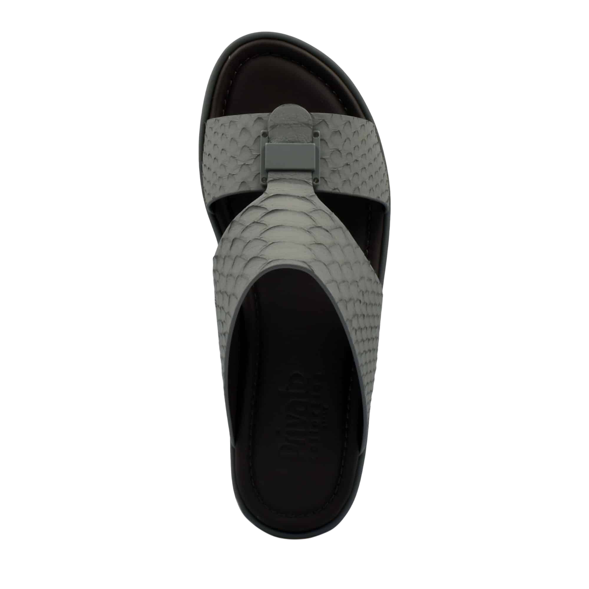 Top view of gray python skin footwear sandal with textured strap and cushioned sole