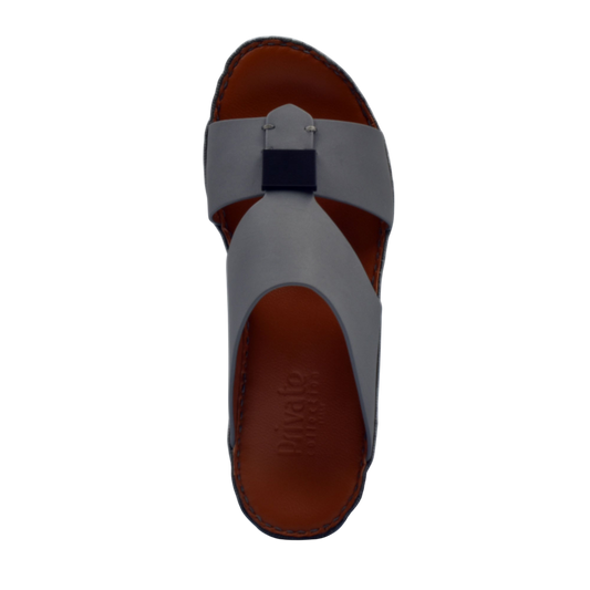 Top view of gray Quadratura Gomato slides with brown footbed and black decorative buckle