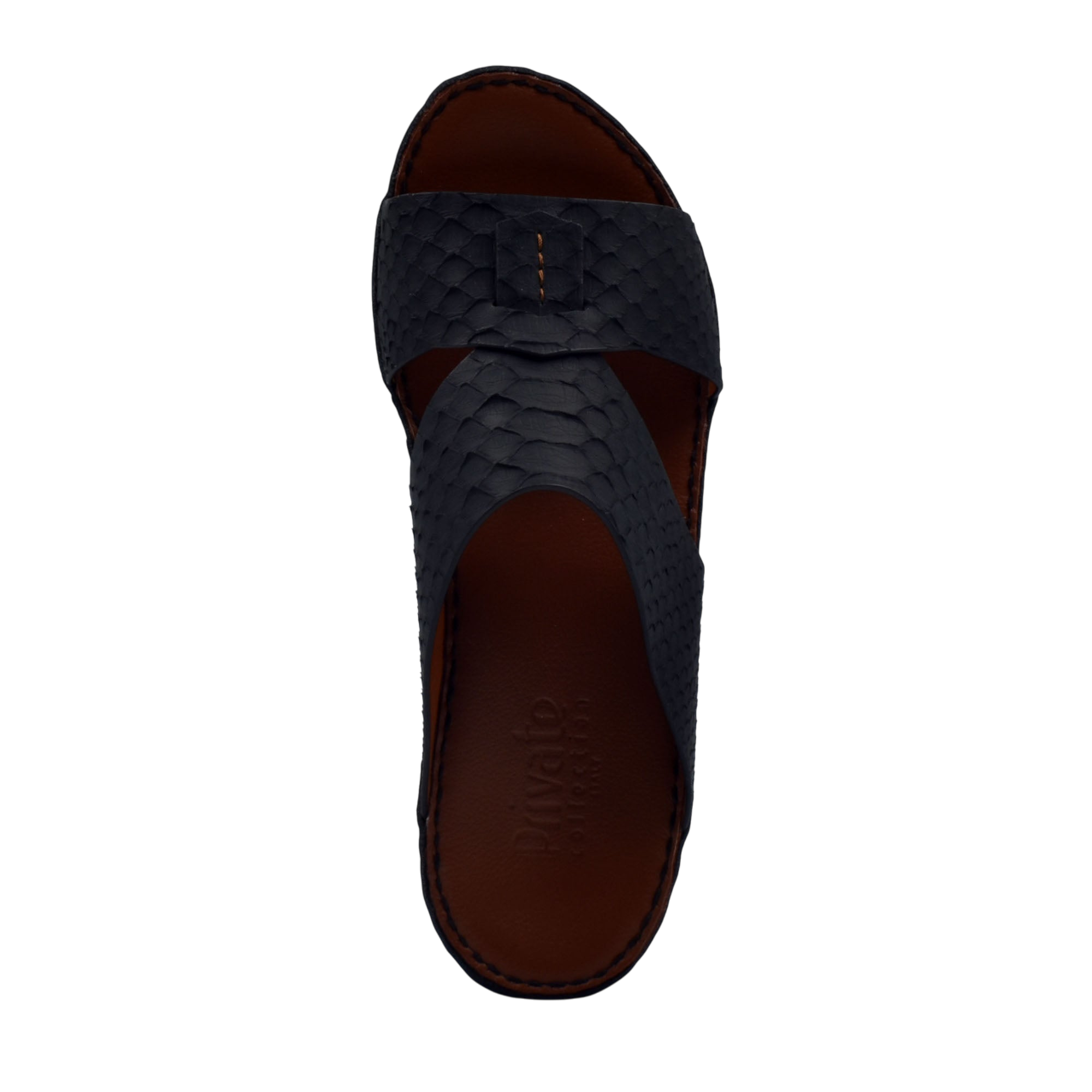 Top view of black rubber python shoes with textured pattern and brown cushioned insole