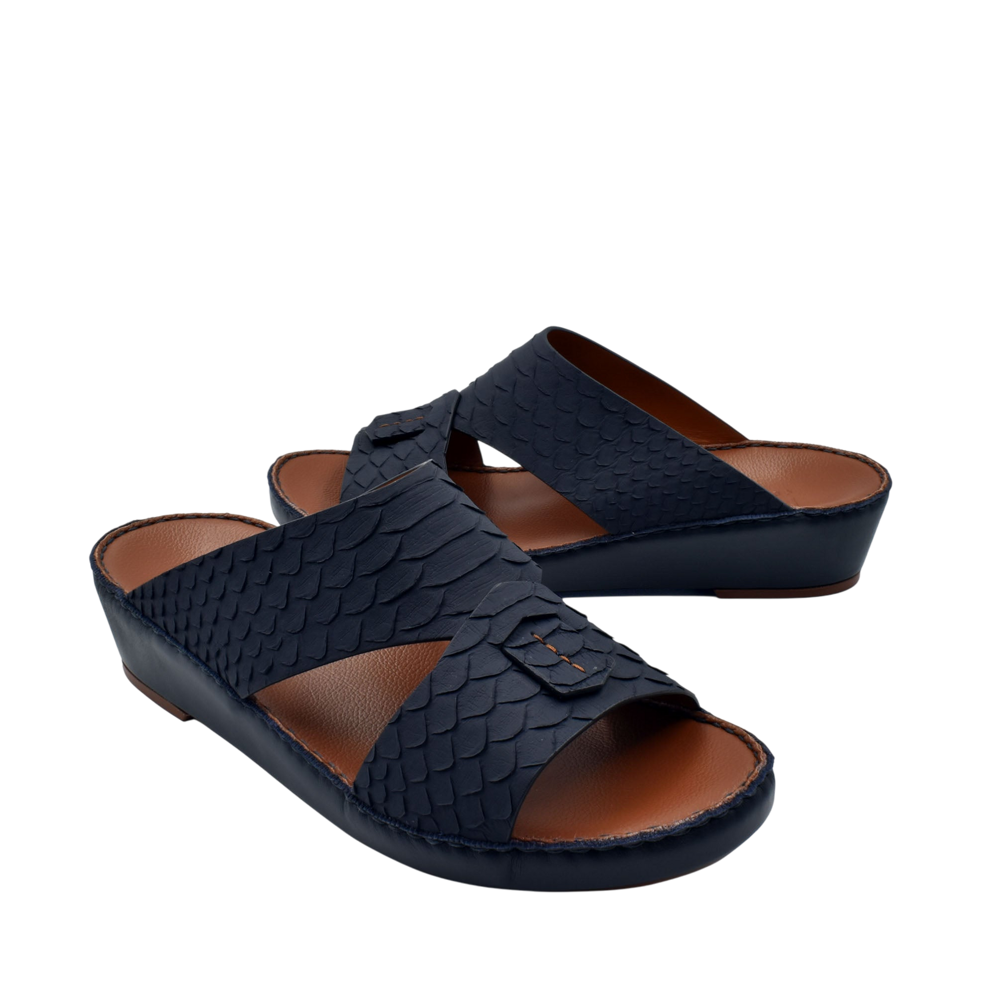 Black rubber python shoes with textured scale pattern and open toe design on brown insole