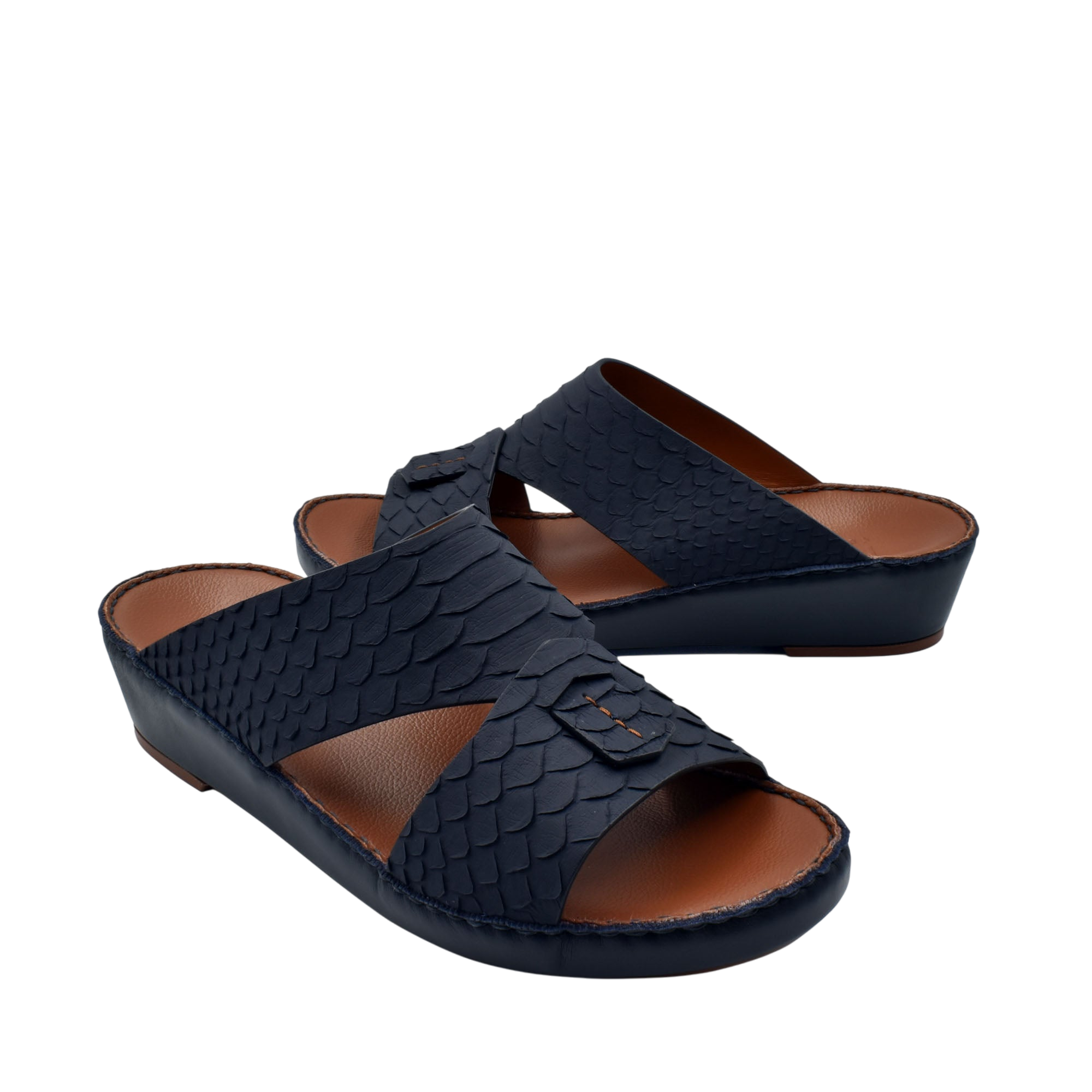 Black rubber python shoes with textured scale pattern and open toe design on brown insole