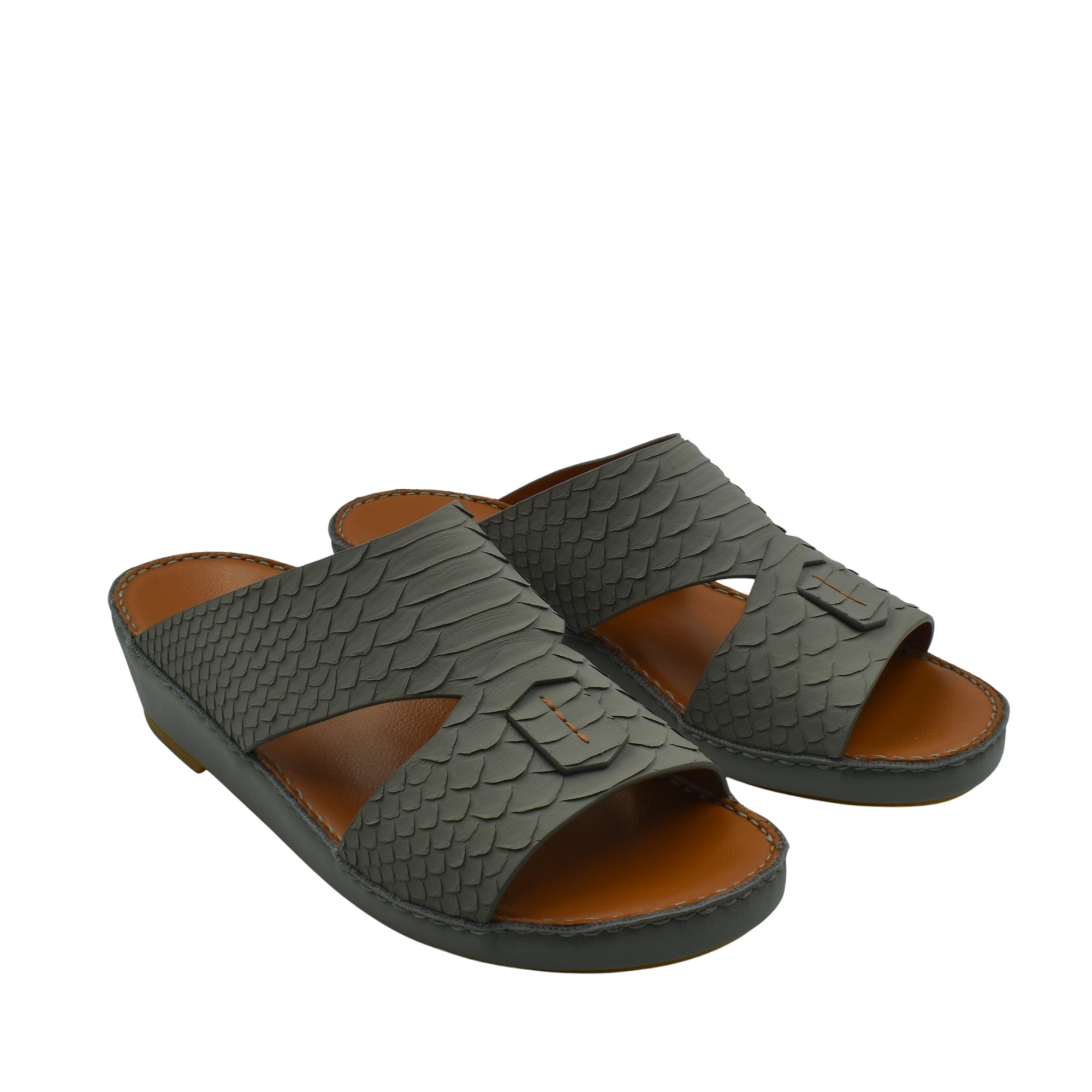 Pair of black rubber python shoes with textured scale pattern and open toe design