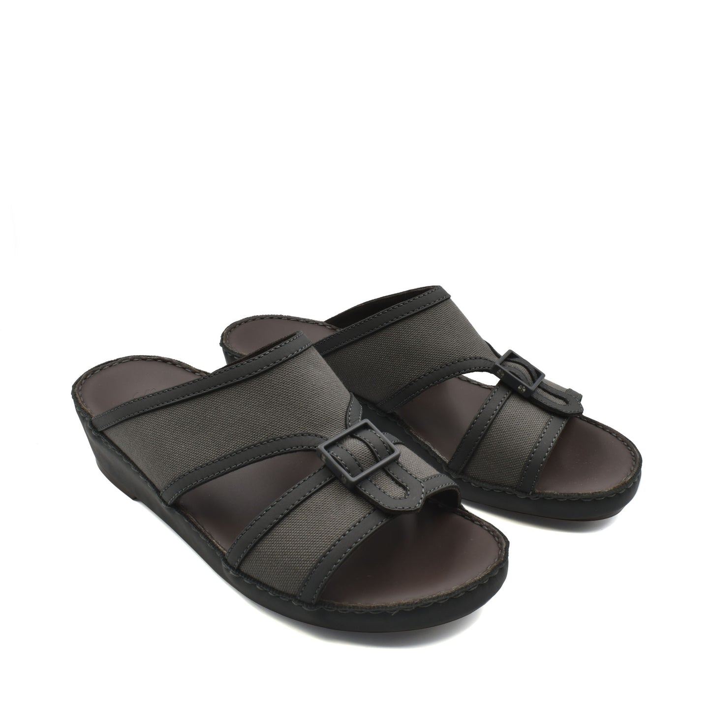 Black softcalf comfort slip on sandals with adjustable buckle straps and cushioned soles