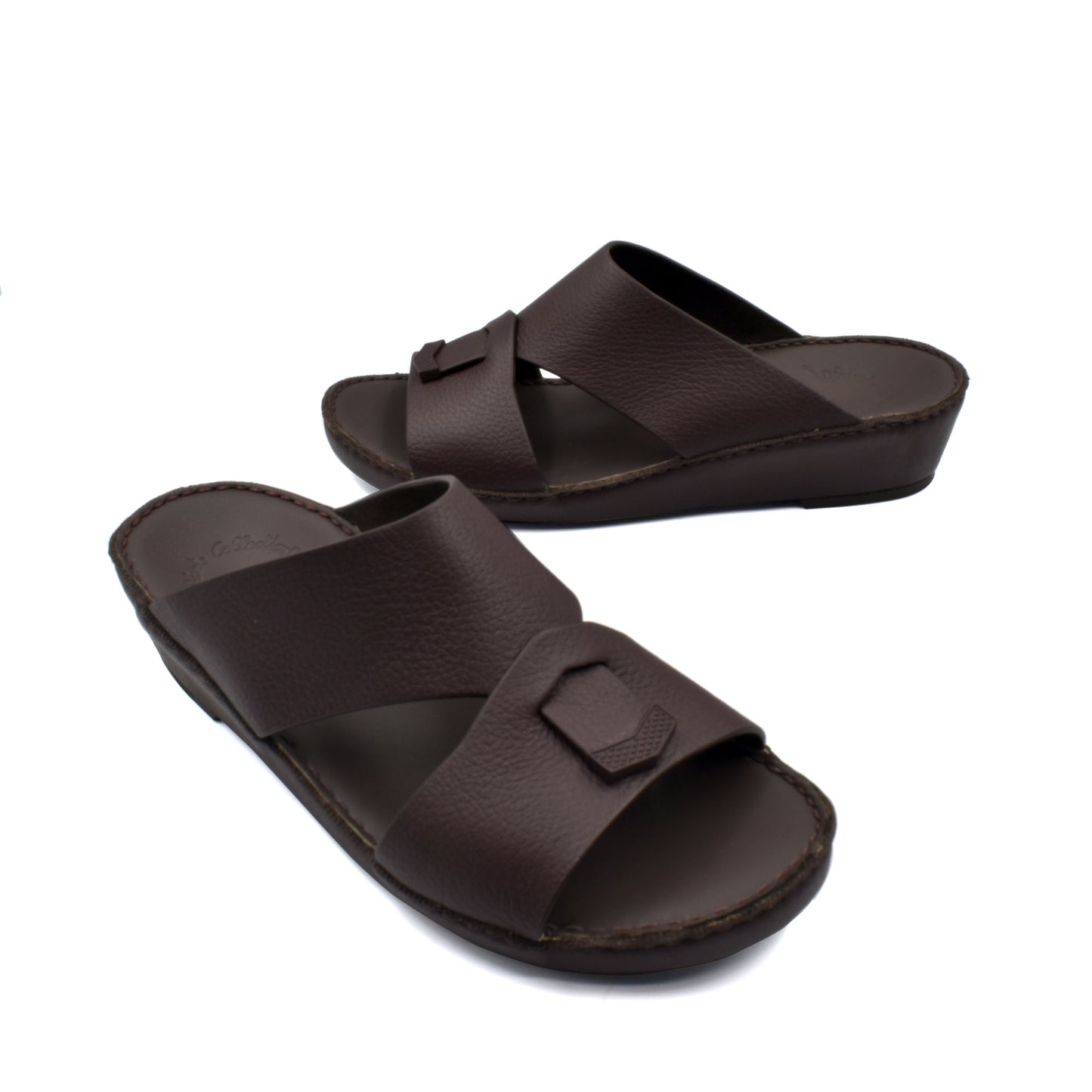 Trendy leather slide sandals in dark brown with wide straps and cushioned footbed from private collection