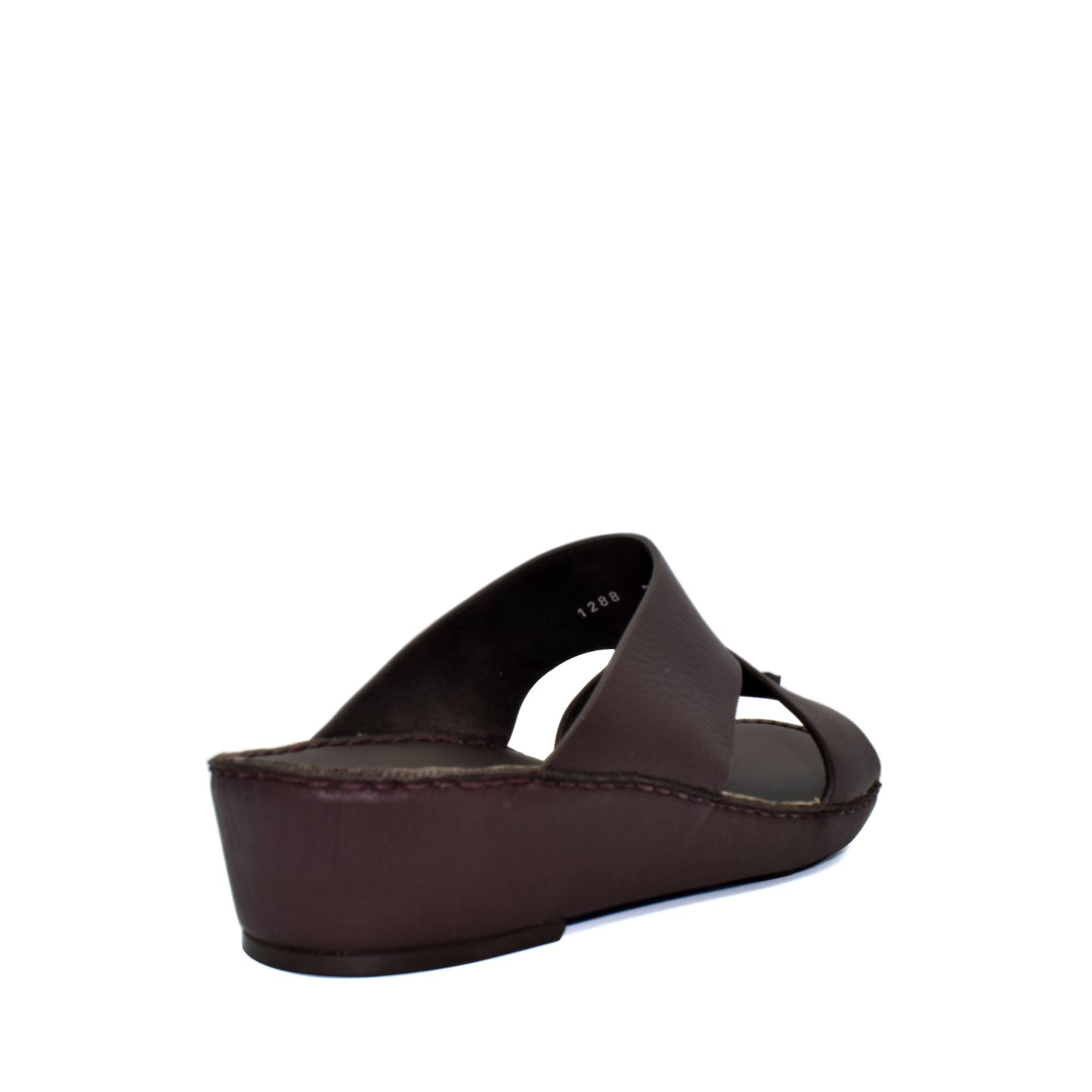 Brown trendy leather slide sandals with cushioned sole from Private collection