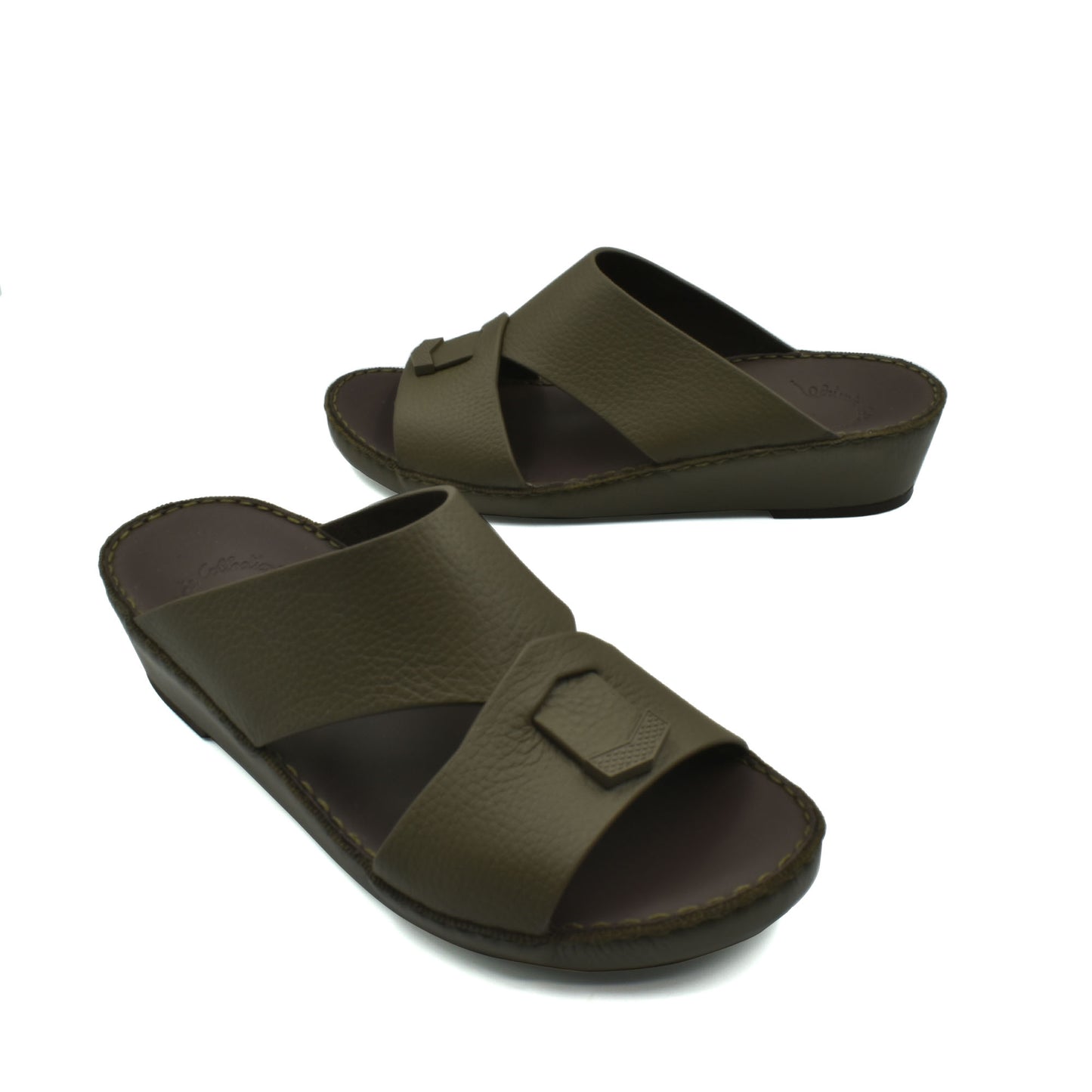 Trendy leather slide sandals in olive green with cushioned sole and cross-strap design
