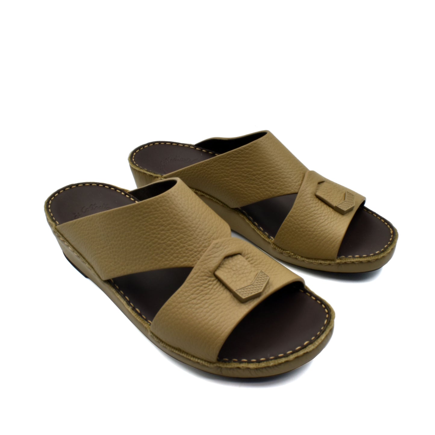 Trendy leather slide sandals in tan with wide straps and cushioned sole for comfortable wear