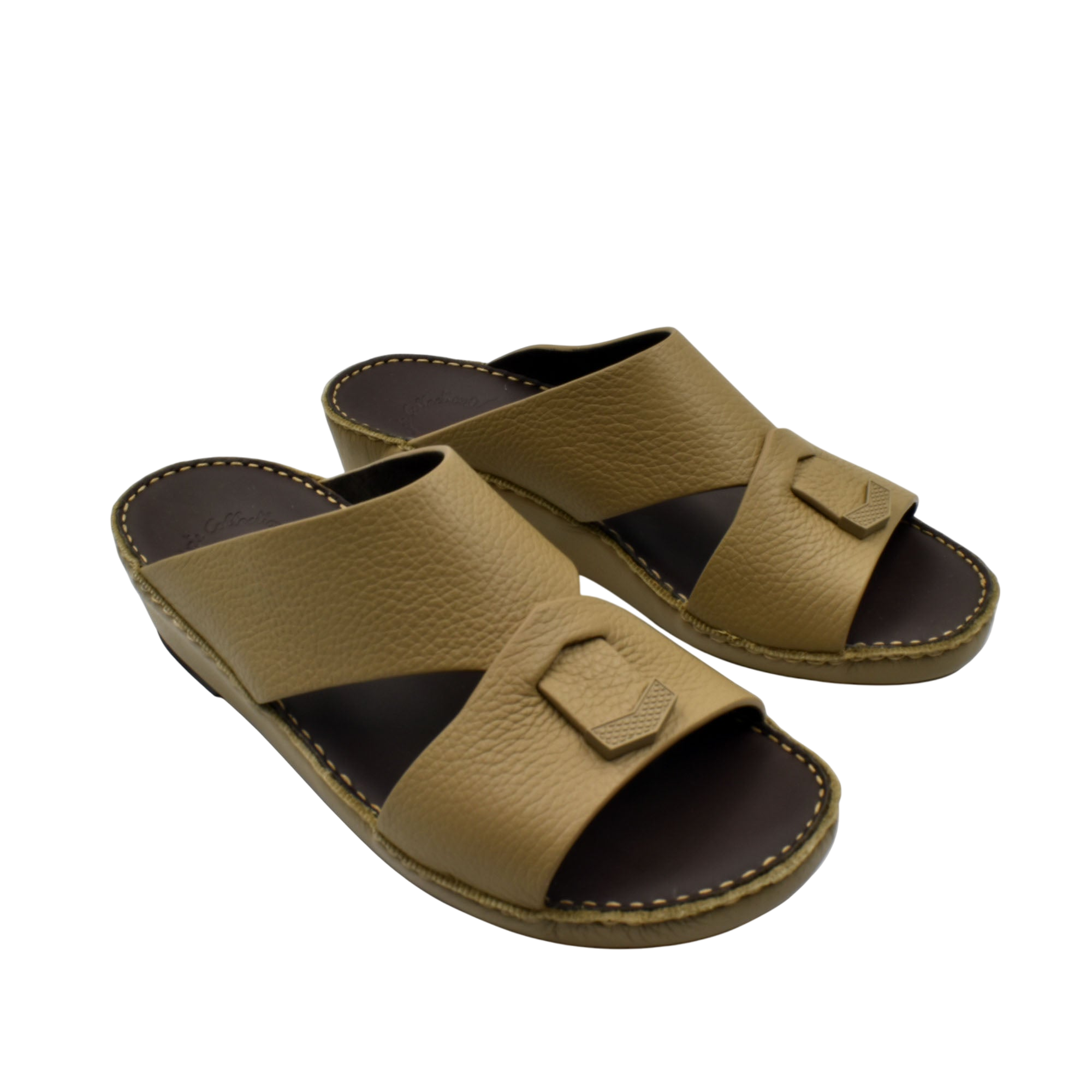 Trendy leather slide sandals in tan with wide straps and cushioned sole for comfortable wear