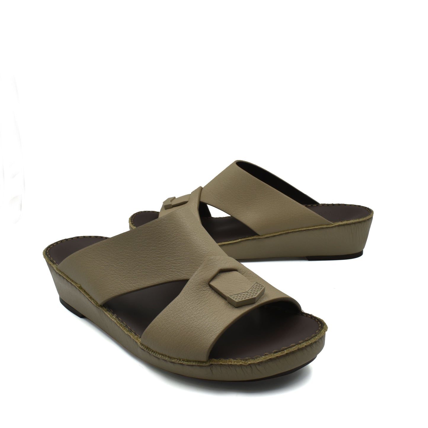 Trendy leather slide sandals in tan with wide cross straps and low wedge sole from Private Collection