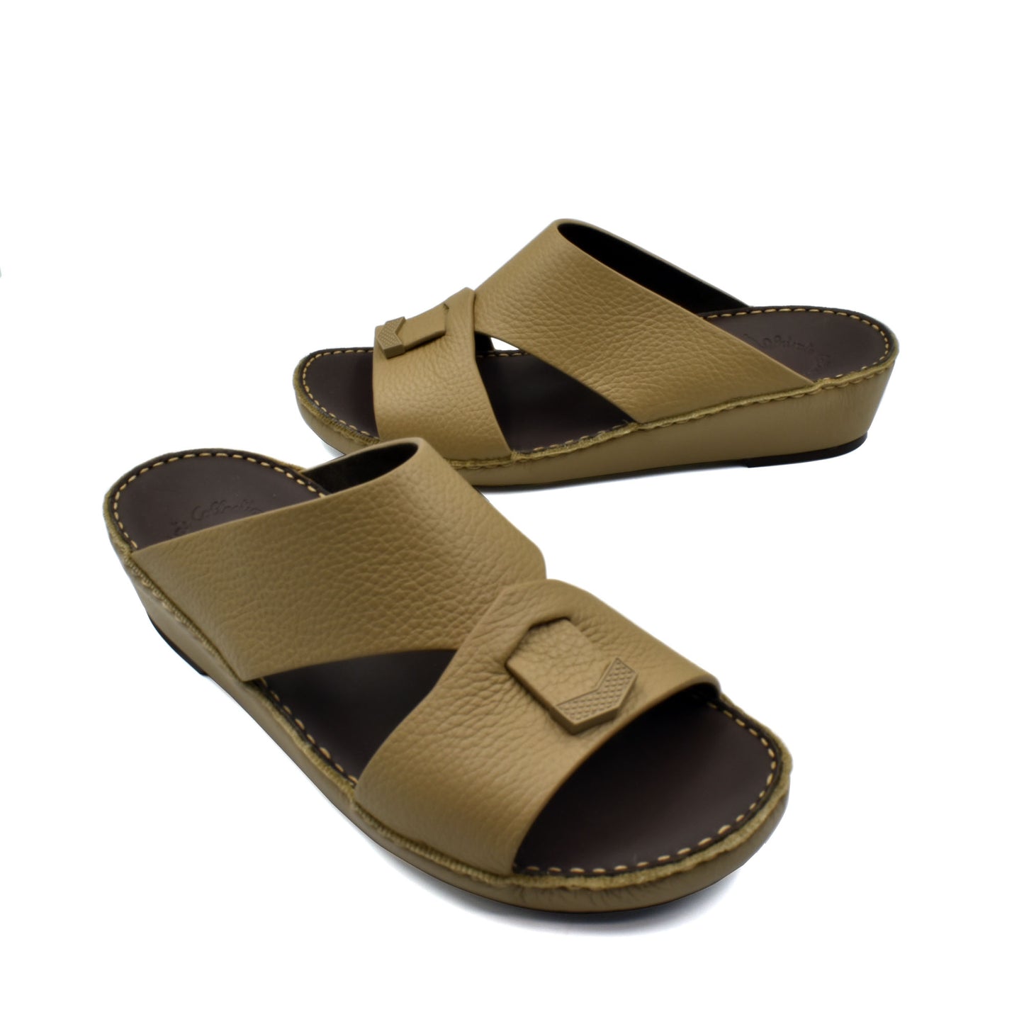 Beige trendy leather slide sandals with buckle detail and cushioned sole for comfortable wear