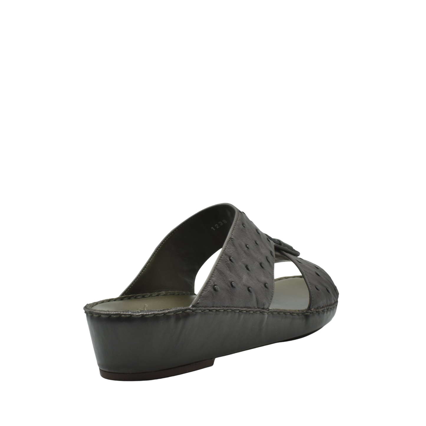 Black ostrich leather sandals with wedge heel and open toe design from Private Collection