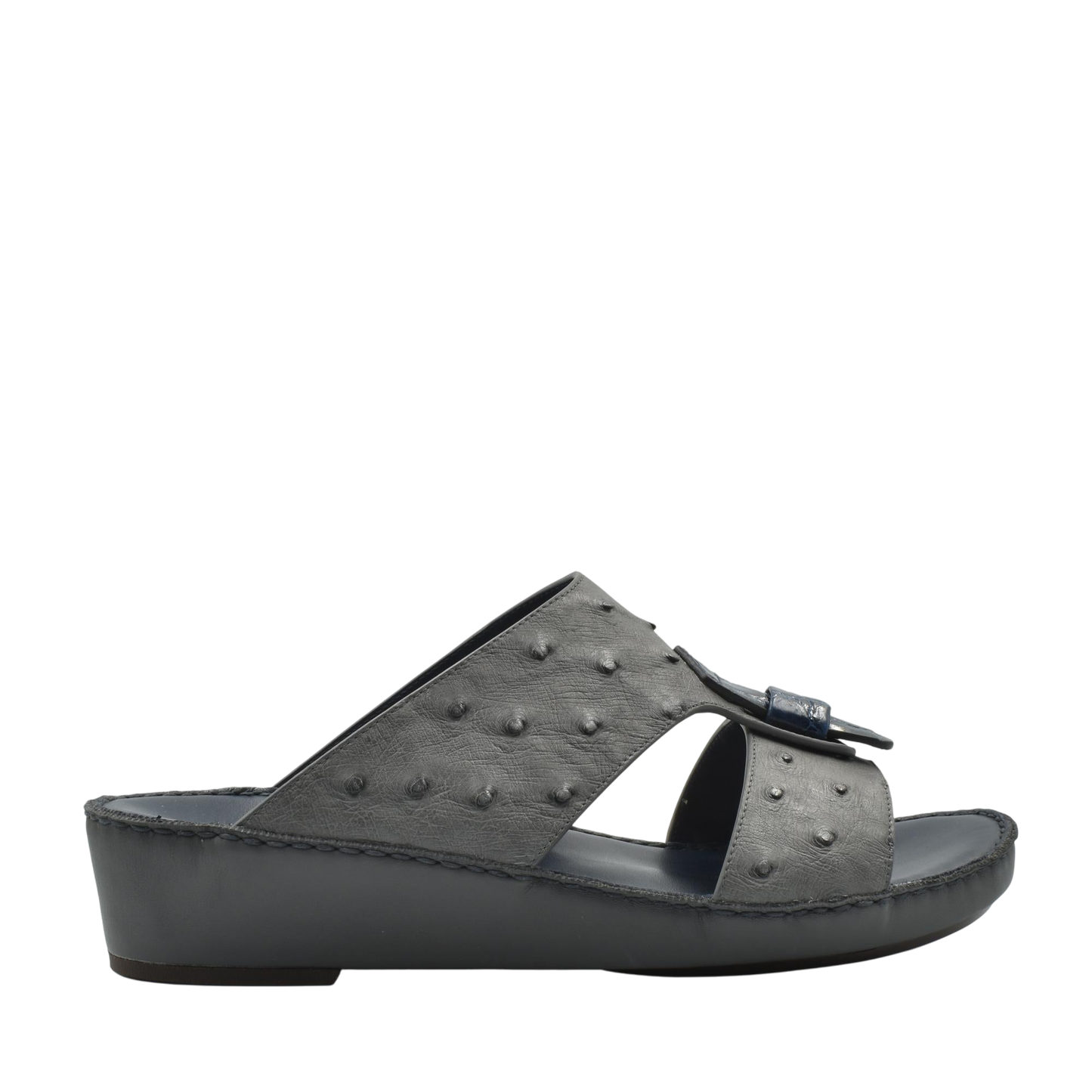 Black ostrich leather sandals with wedge sole and textured leather upper from Private collection