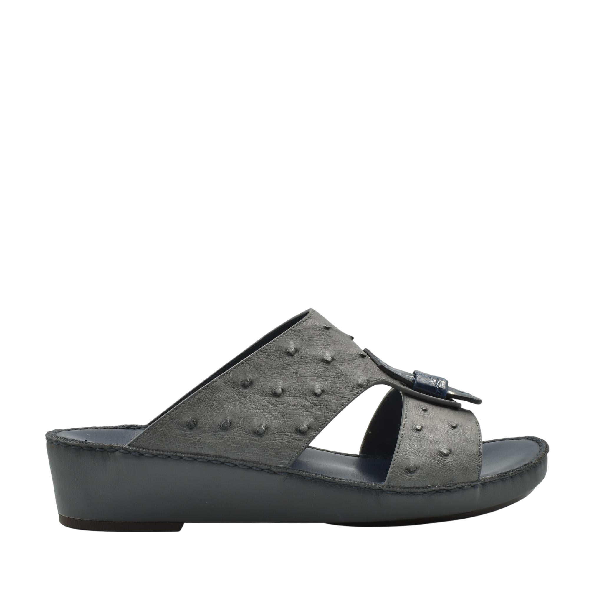 Black ostrich leather sandals with wedge sole and textured leather upper from Private collection